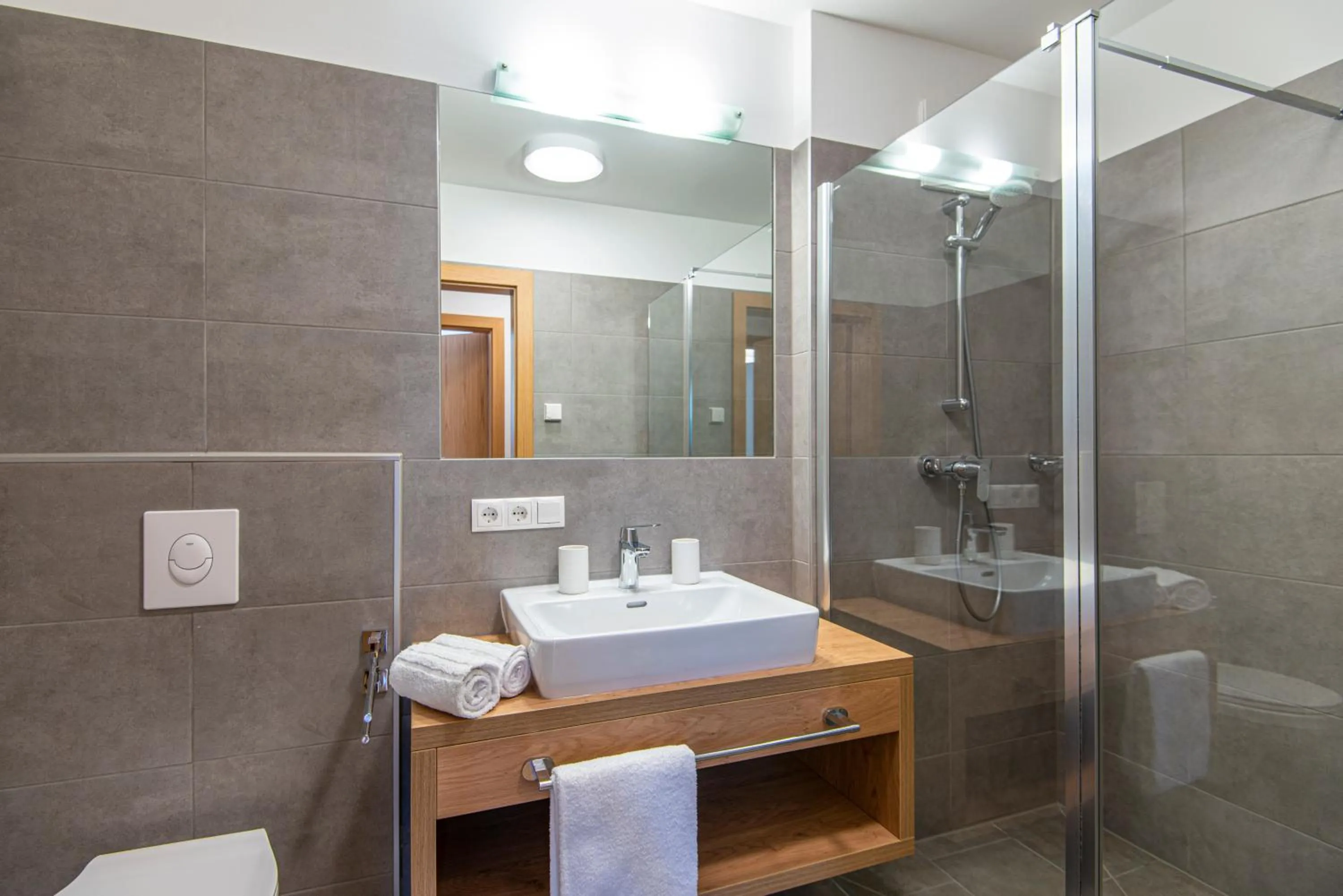 Shower in Apartment Dorf Wagrain Alpenleben by AlpenTravel