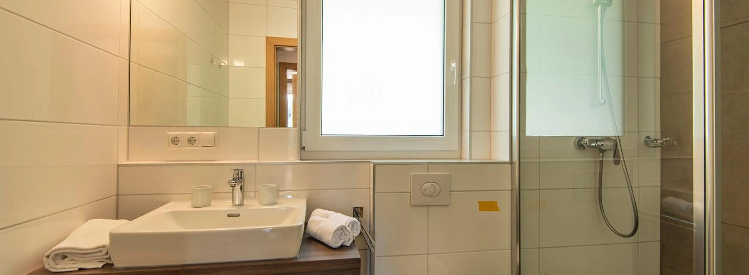 Bathroom in Apartment Dorf Wagrain Alpenleben by AlpenTravel