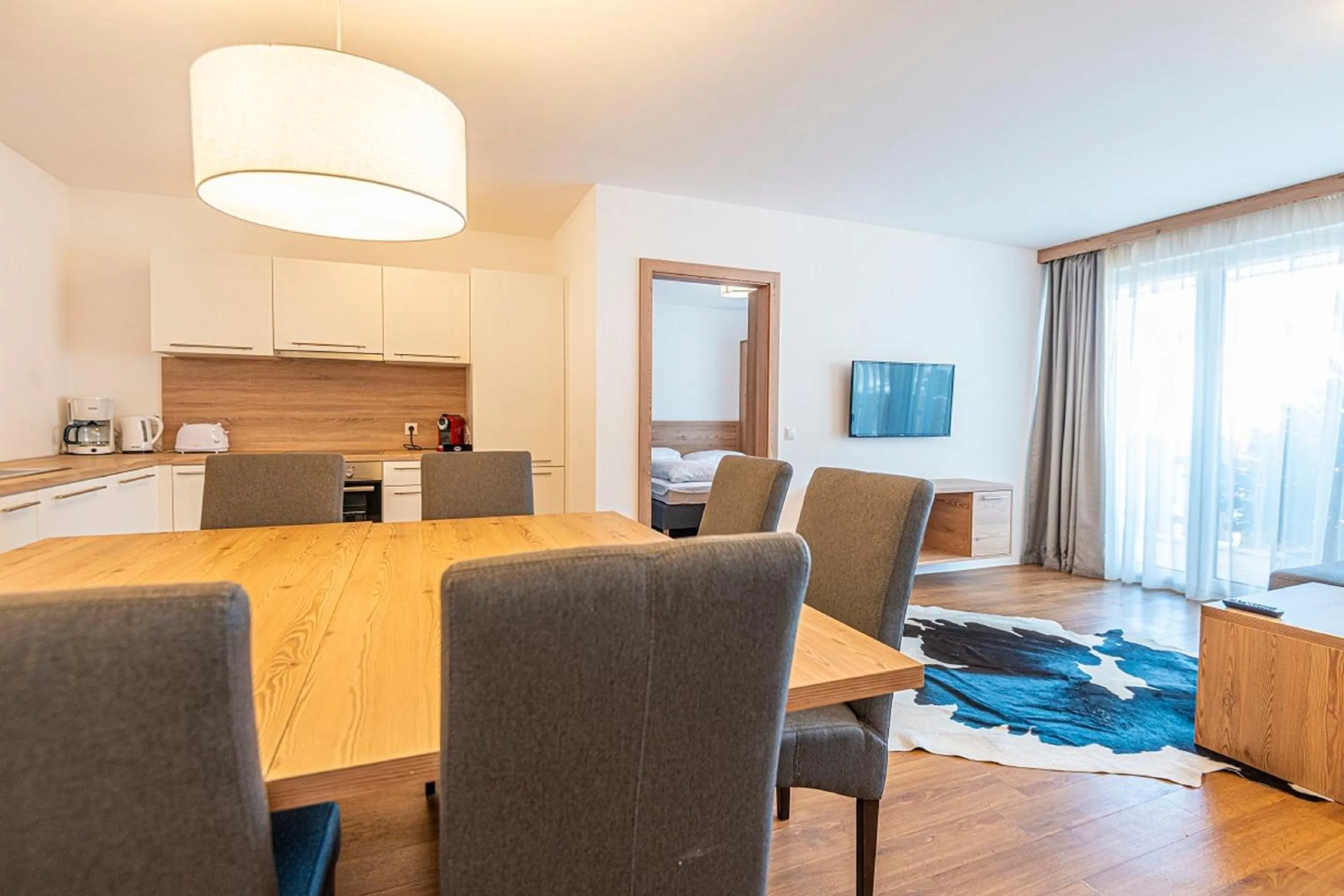 Living room in Apartment Dorf Wagrain Alpenleben by AlpenTravel