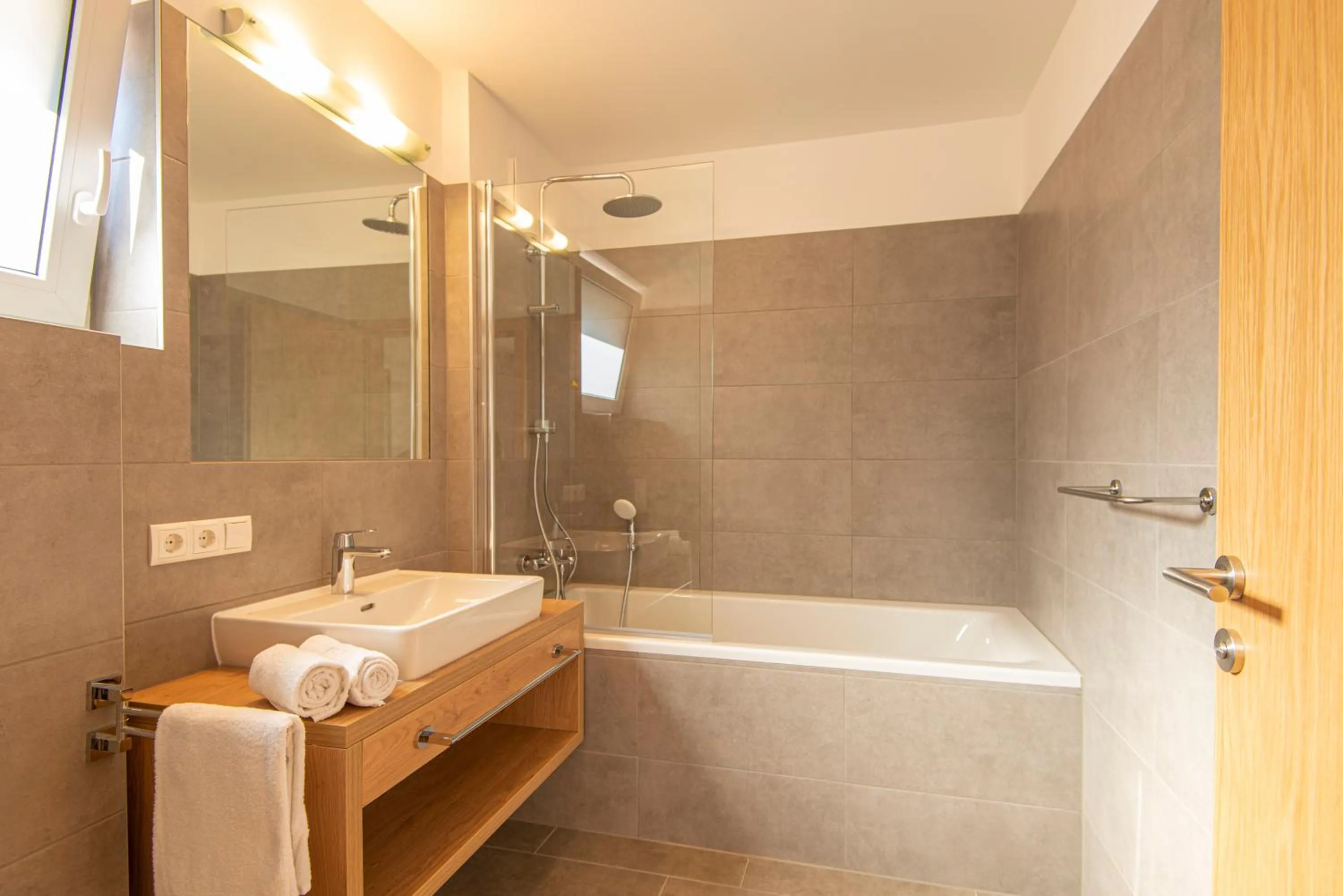 Bathroom in Apartment Dorf Wagrain Alpenleben by AlpenTravel