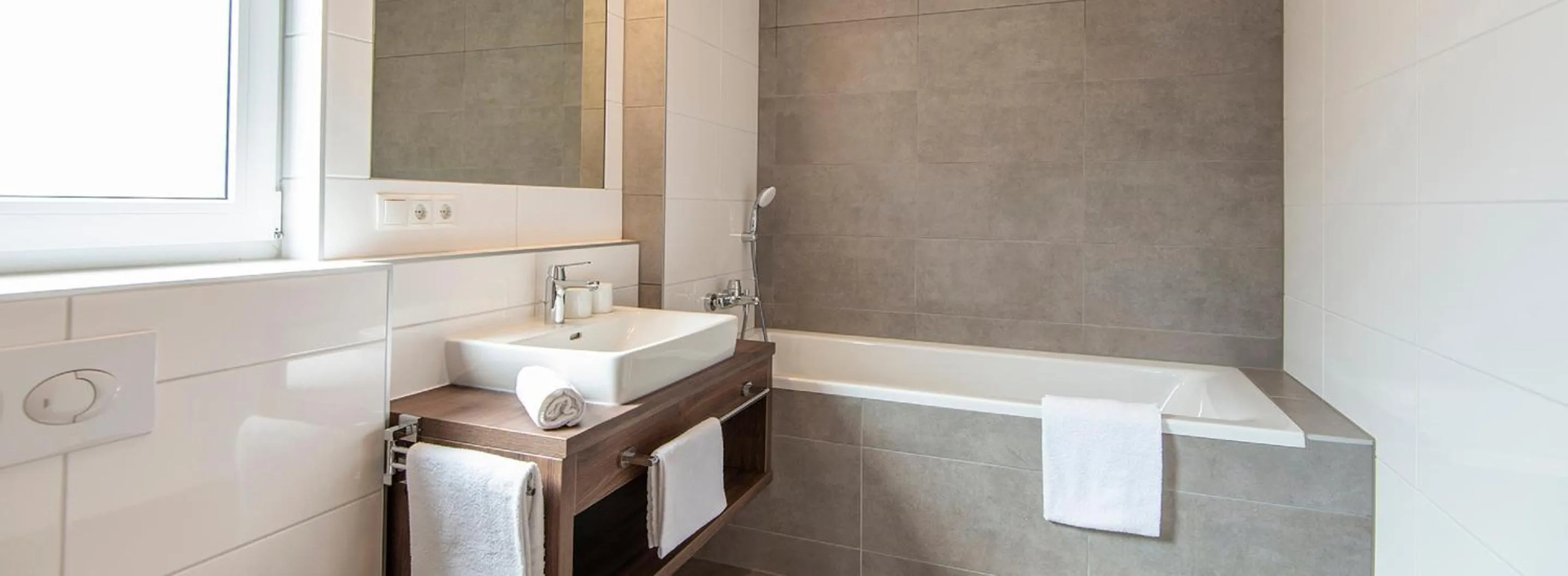 Bathroom in Apartment Dorf Wagrain Alpenleben by AlpenTravel