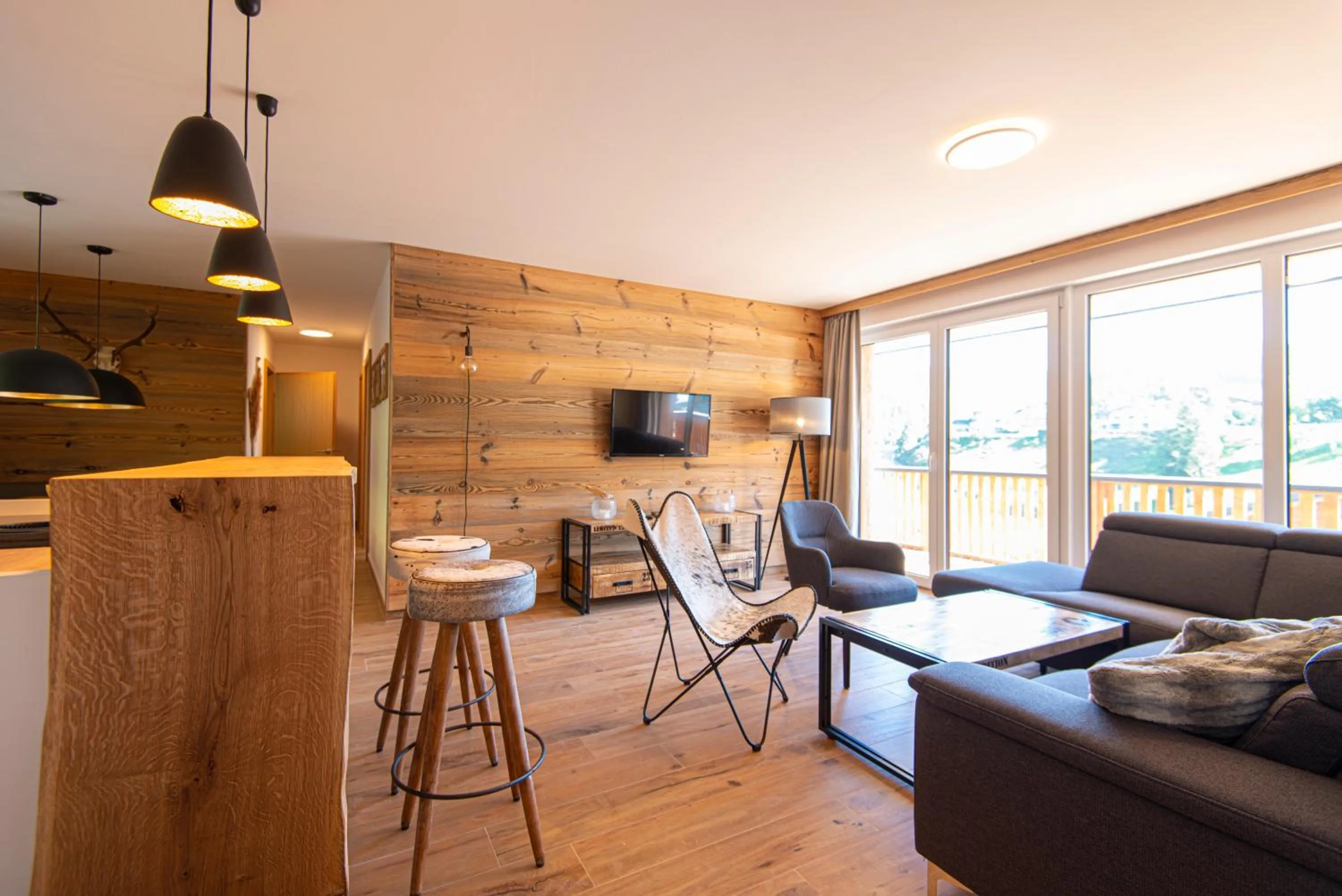 Living room in Apartment Dorf Wagrain Alpenleben by AlpenTravel
