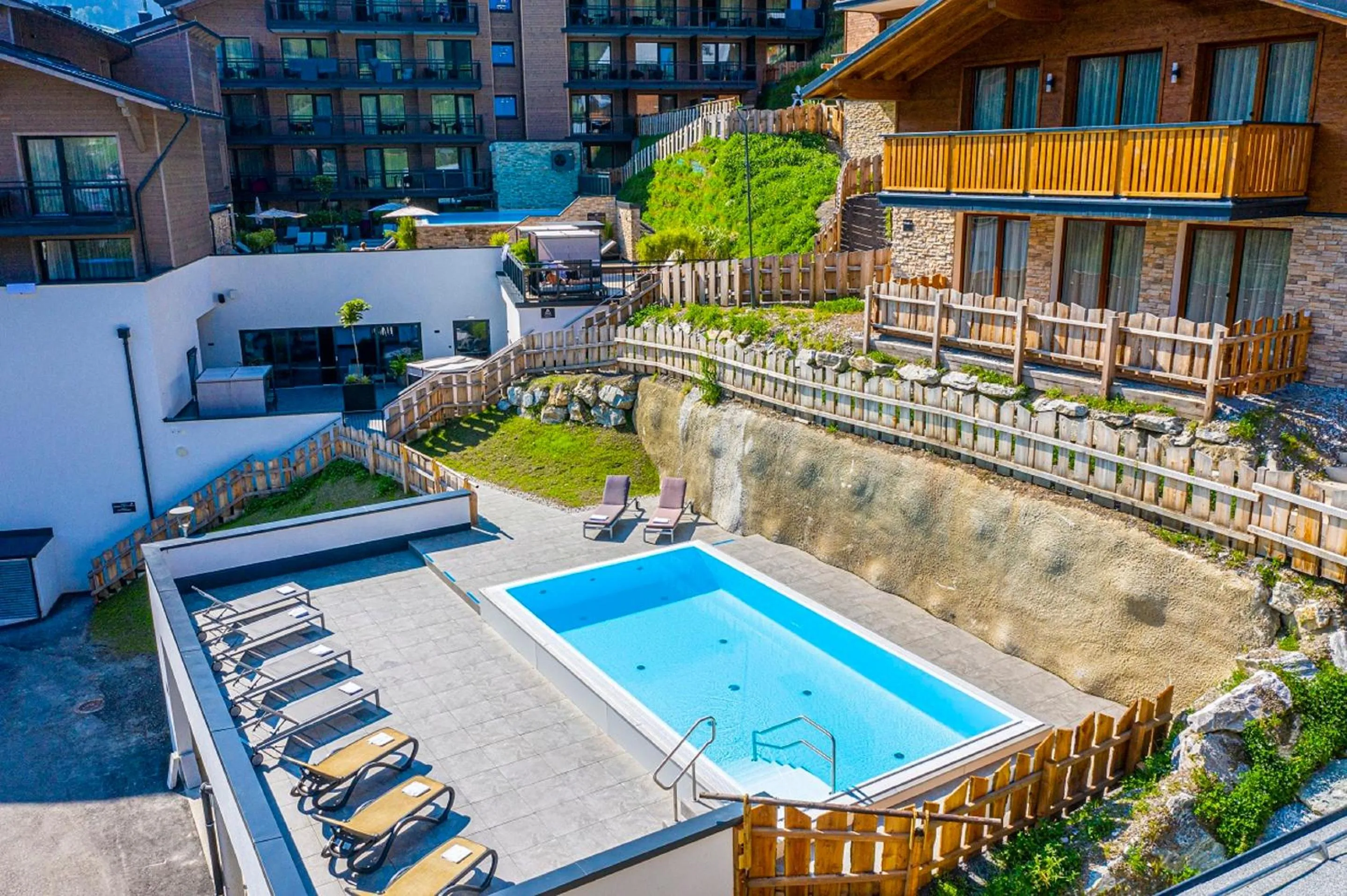 Pool view in Apartment Dorf Wagrain Alpenleben by AlpenTravel