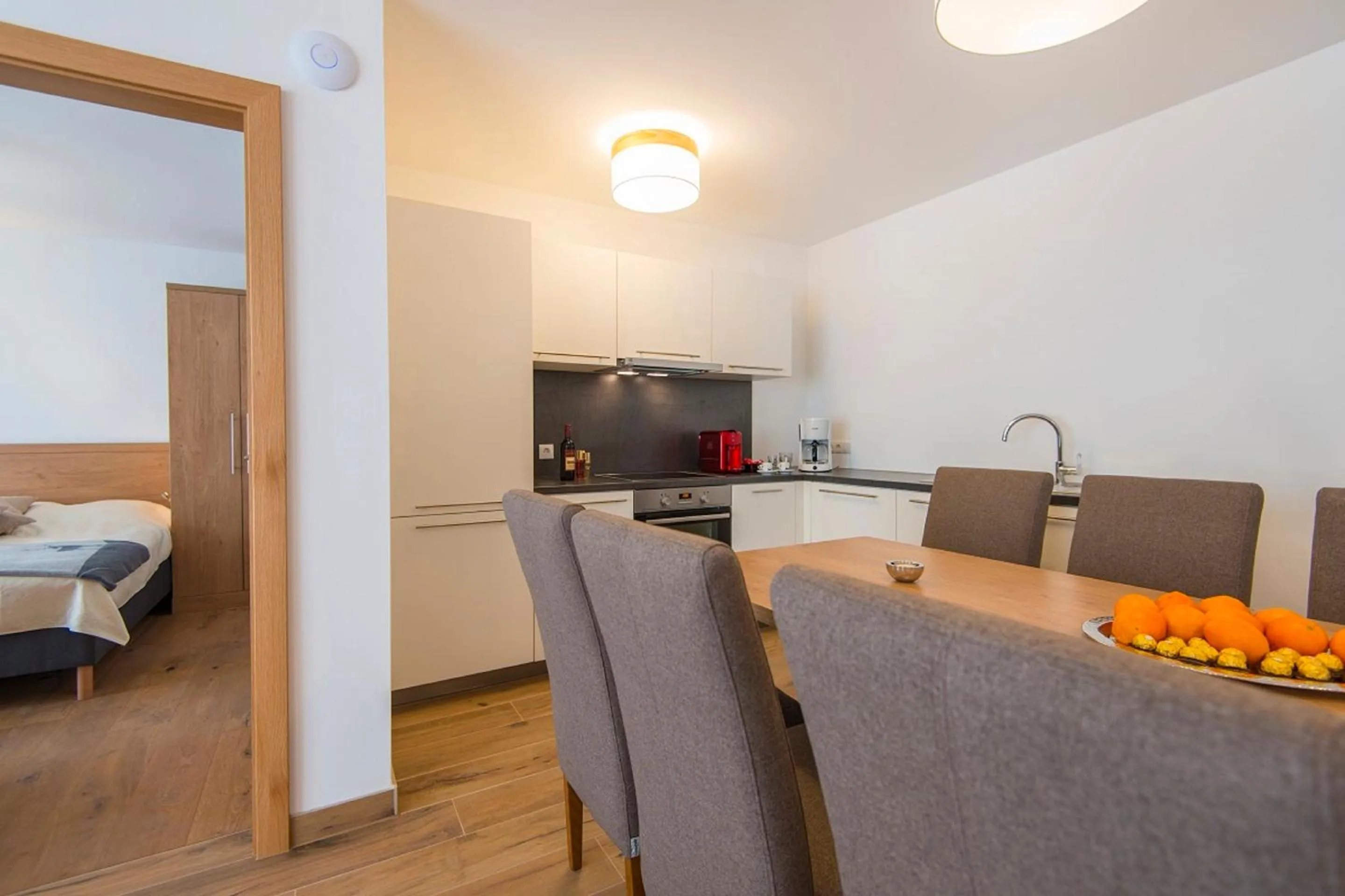 kitchen, Bed in Apartment Dorf Wagrain Alpenleben by AlpenTravel