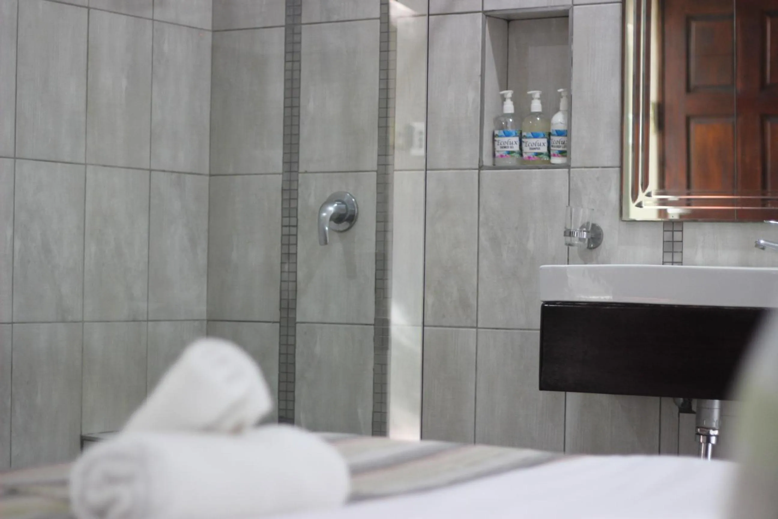 Shower in Ecolux Boutique Hotel