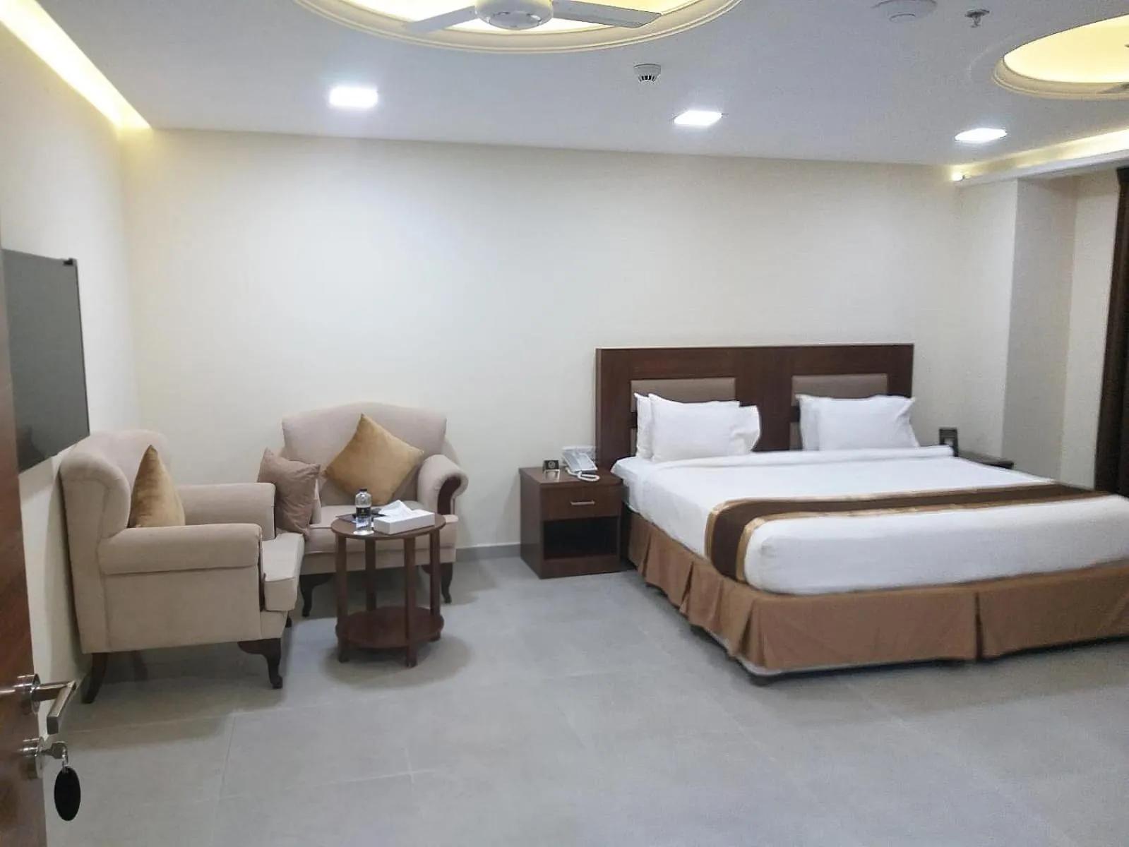 Seating area, Bed in Bristol Hotel Salalah