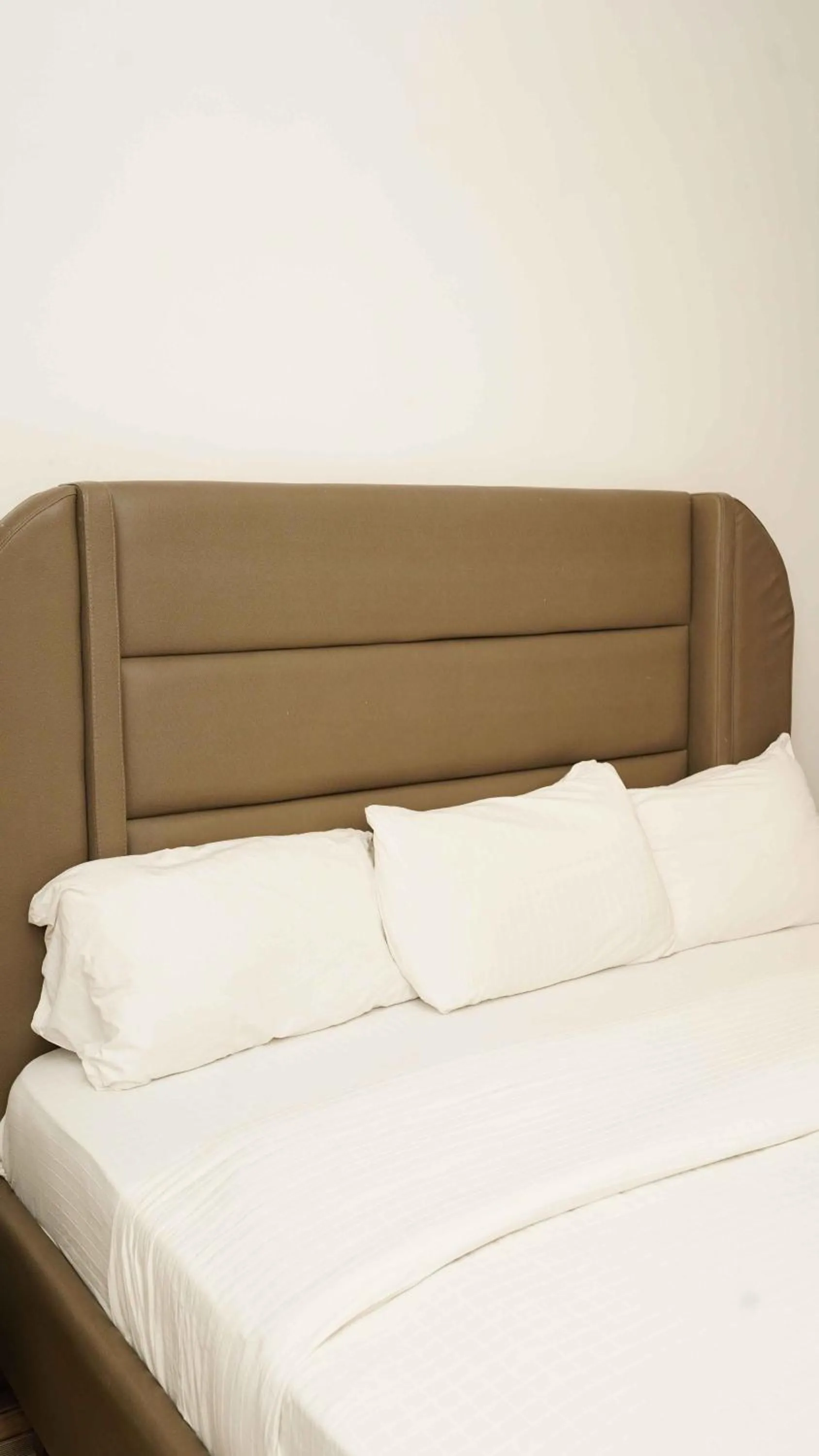 Bed in James Court Hotel & Luxury Apartments