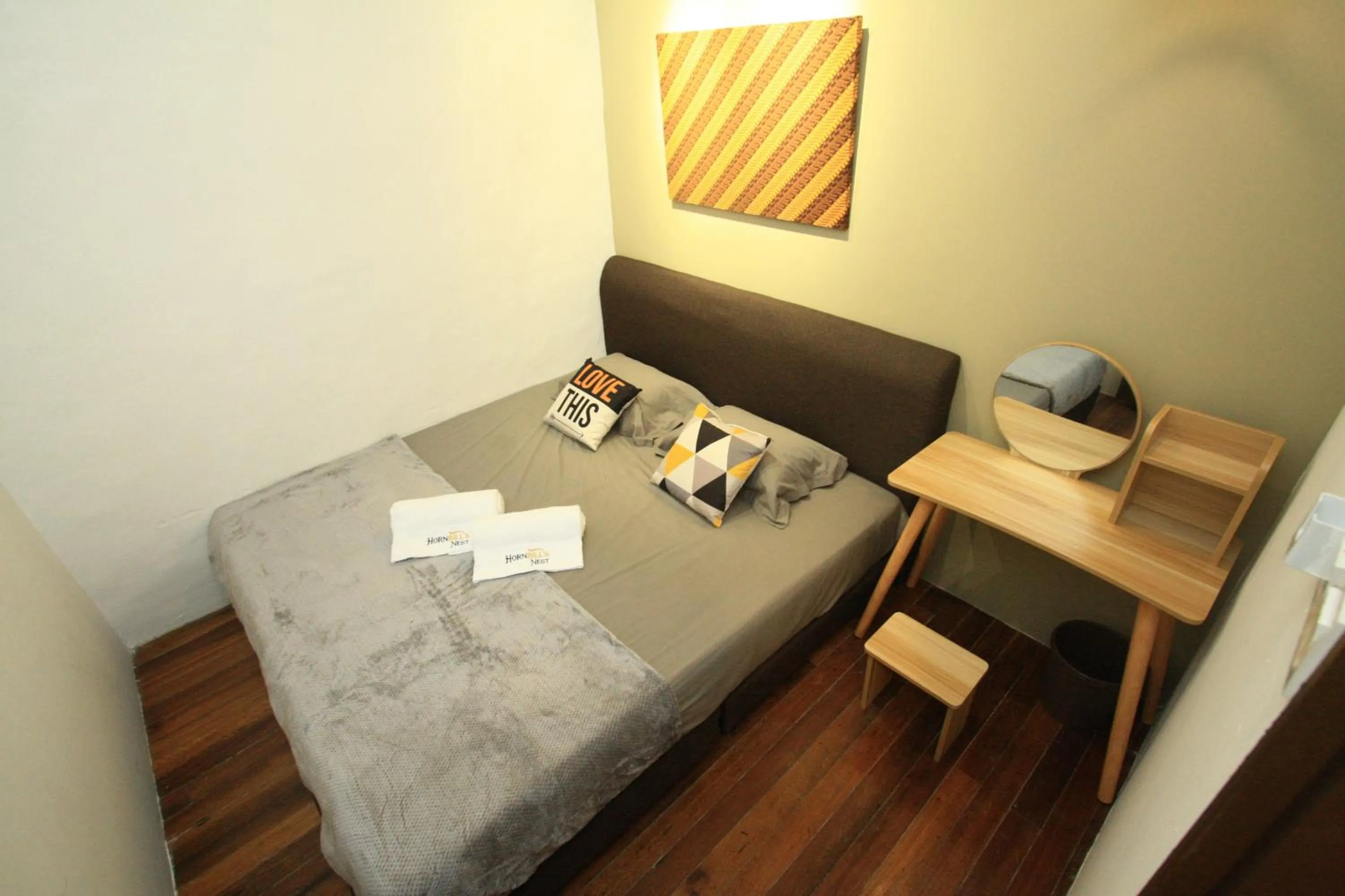 Photo of the whole room, Bed in Hornbill's Nest Kuching