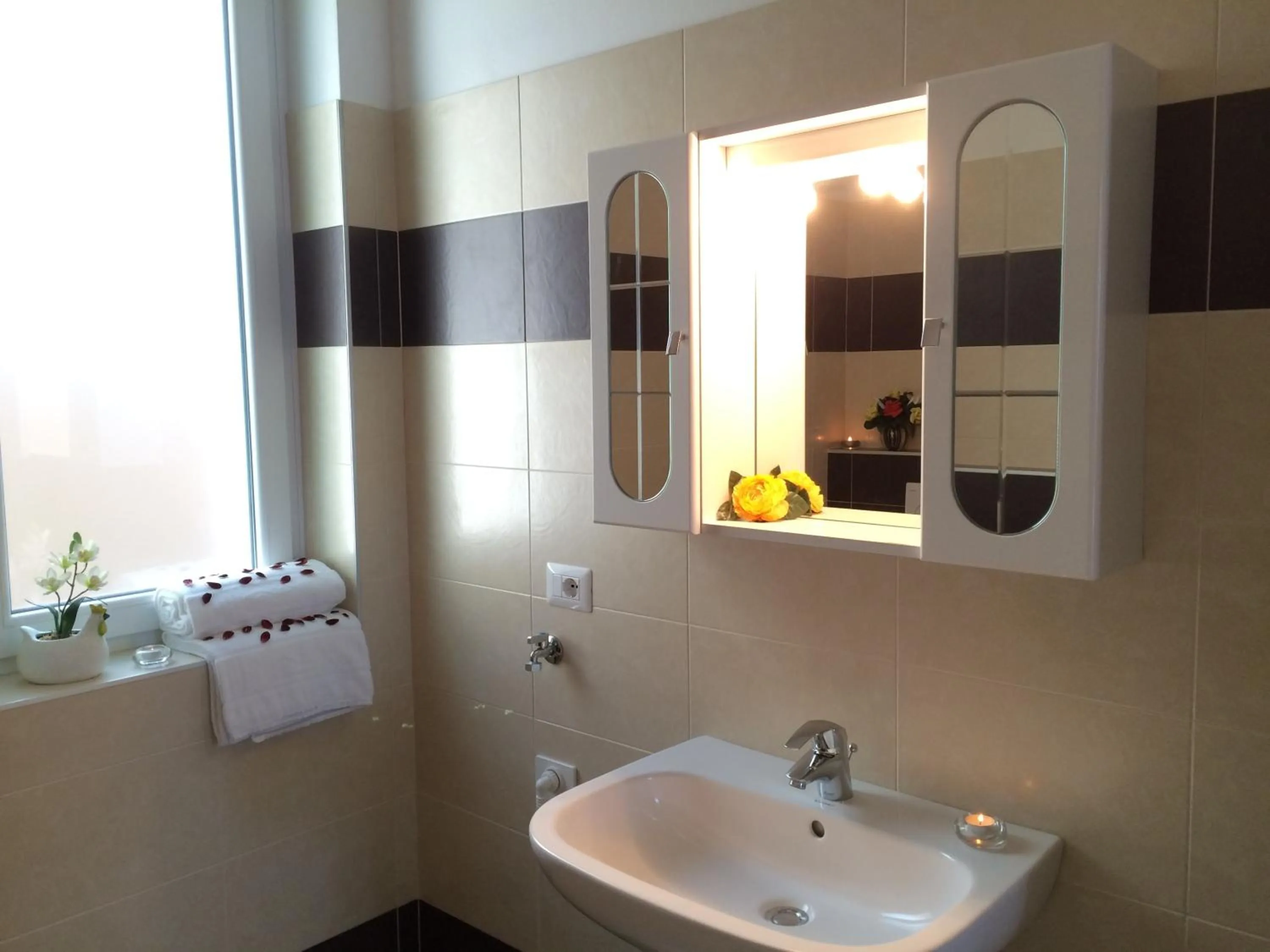 Bathroom in Residence Le Azalee & SPA