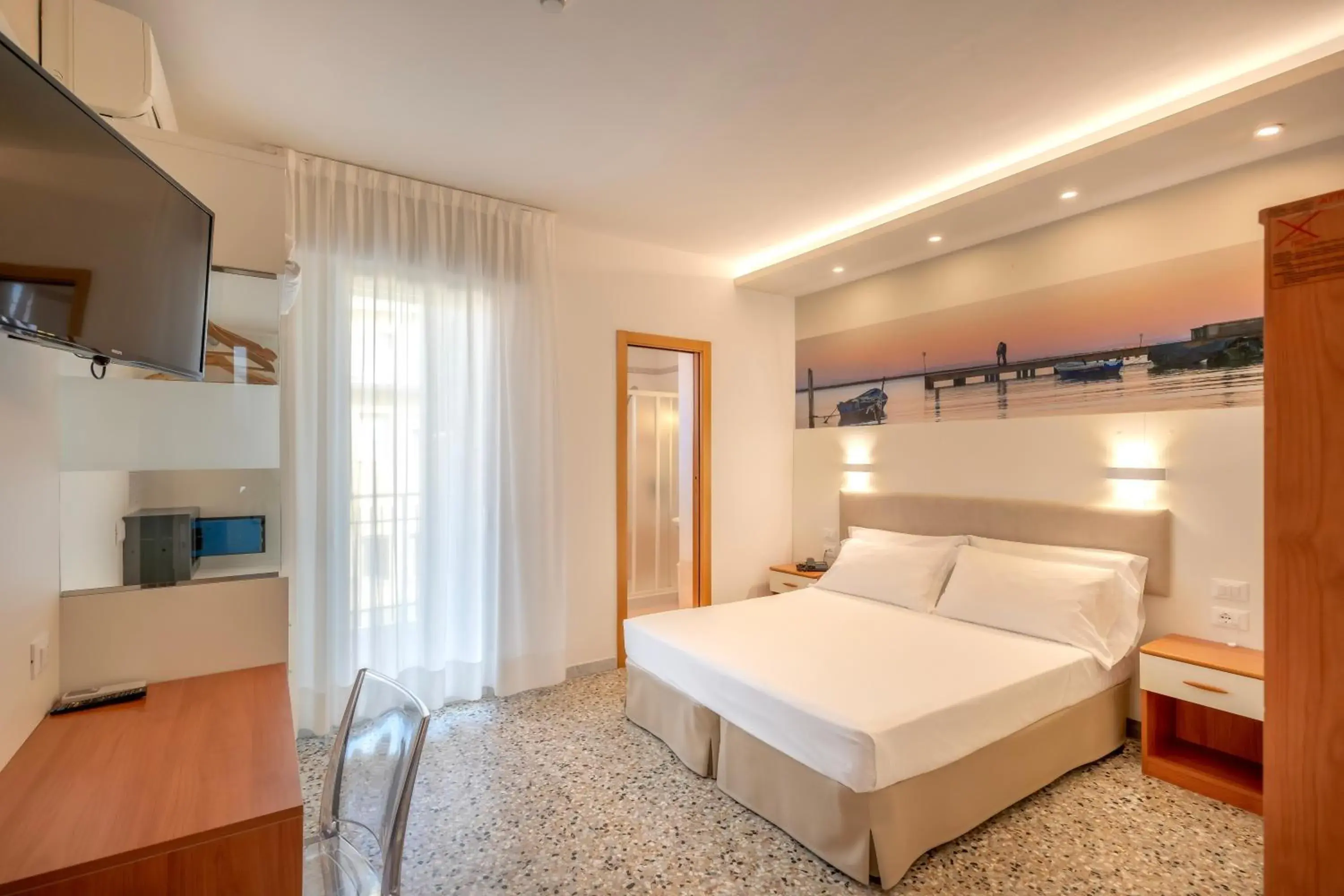 Quadruple Room in Hotel Atenea Golden Star Quadruple Room in Hotel Atenea Golden Star