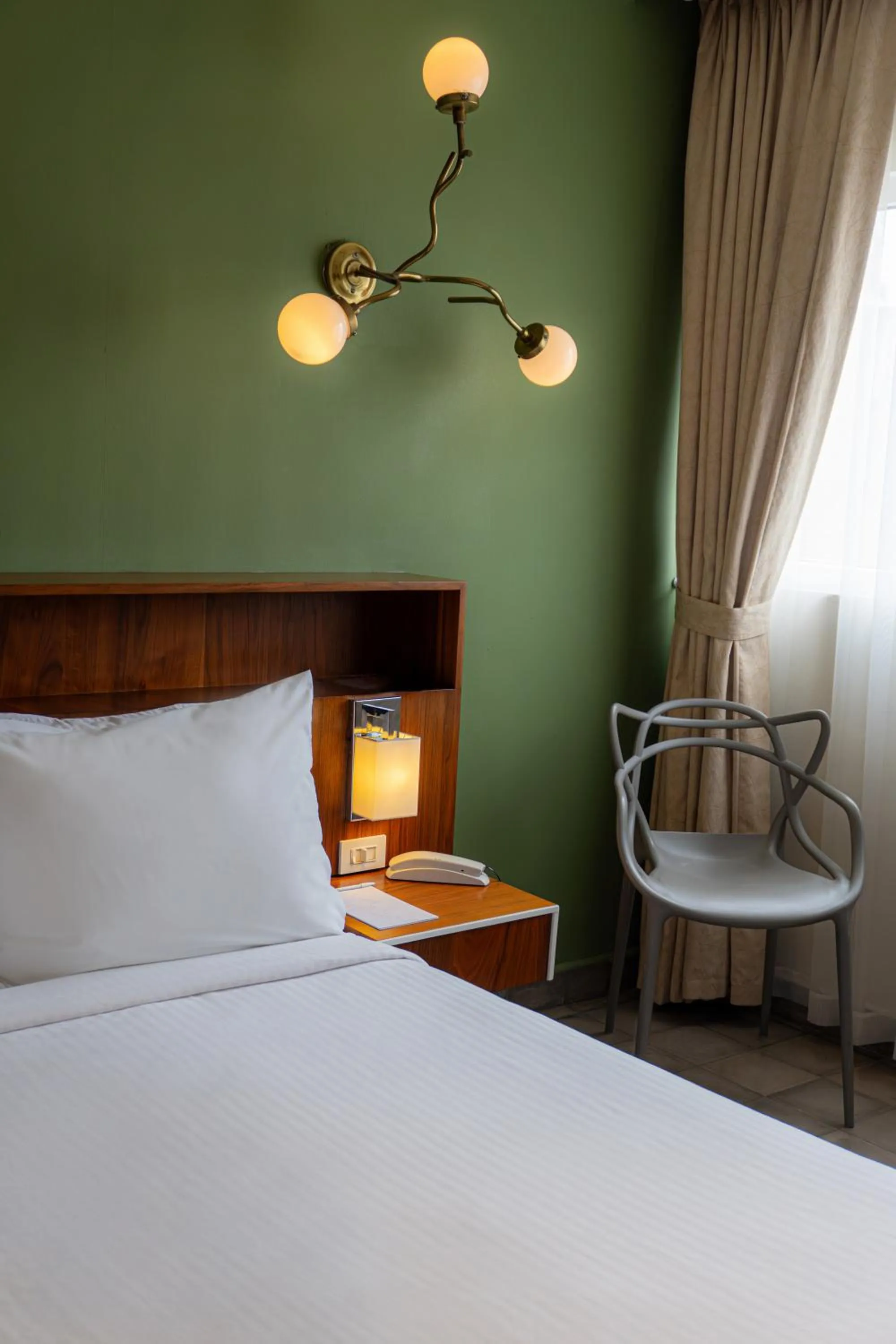 Bed in Flor de Mayo Hotel & Restaurant