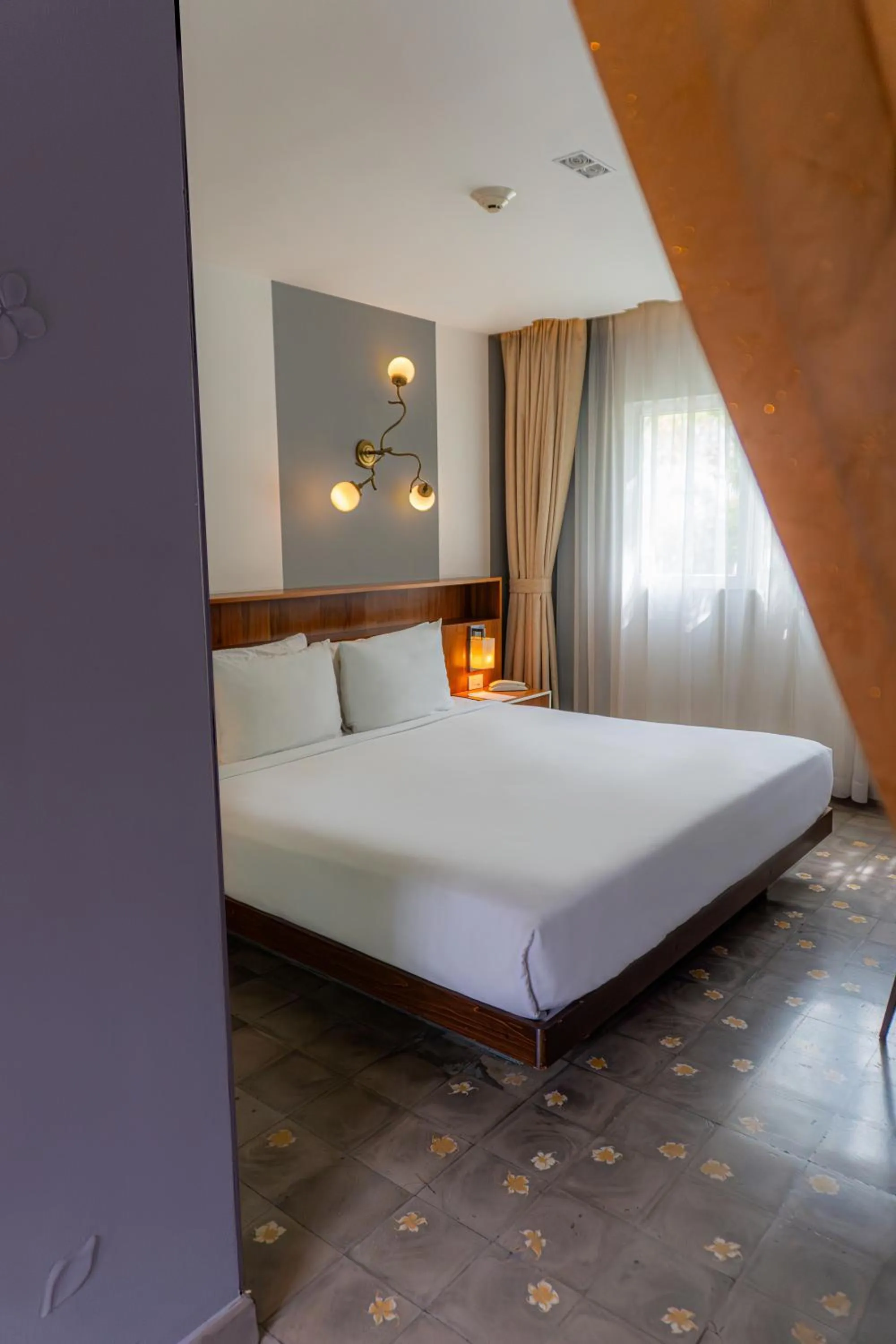 Bed in Flor de Mayo Hotel & Restaurant