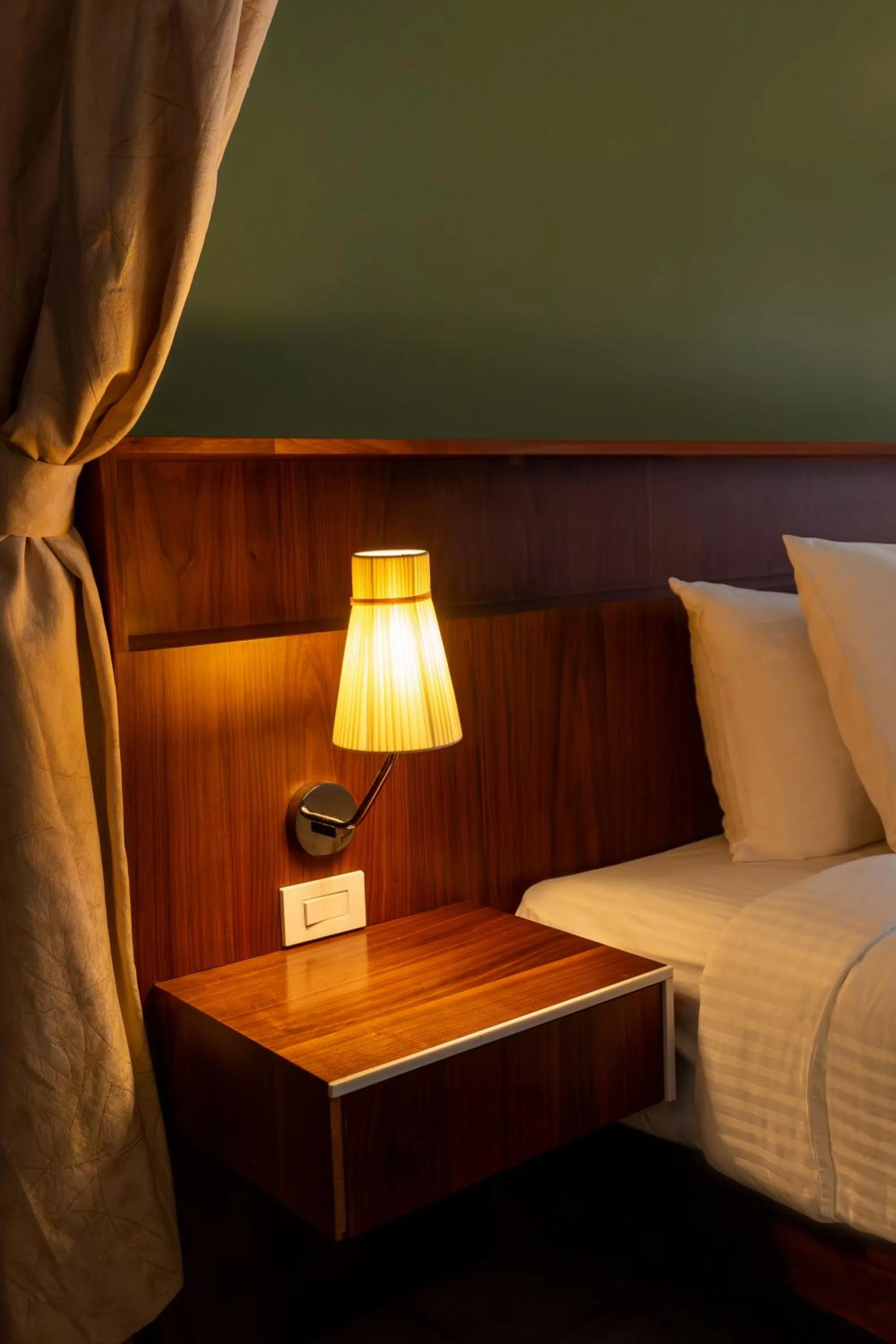 Bed in Flor de Mayo Hotel & Restaurant