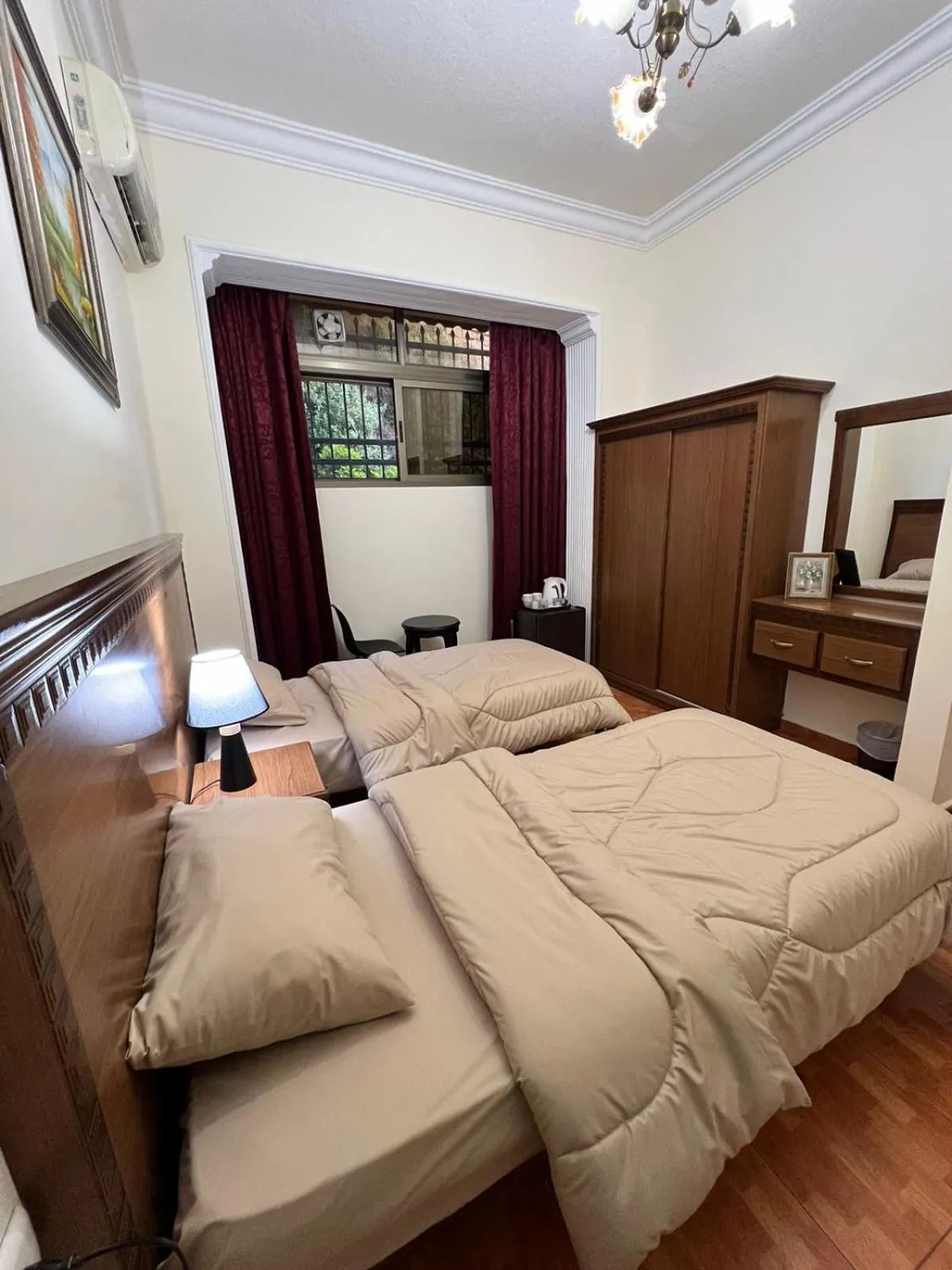 Bed in Sufara Hotel Suites