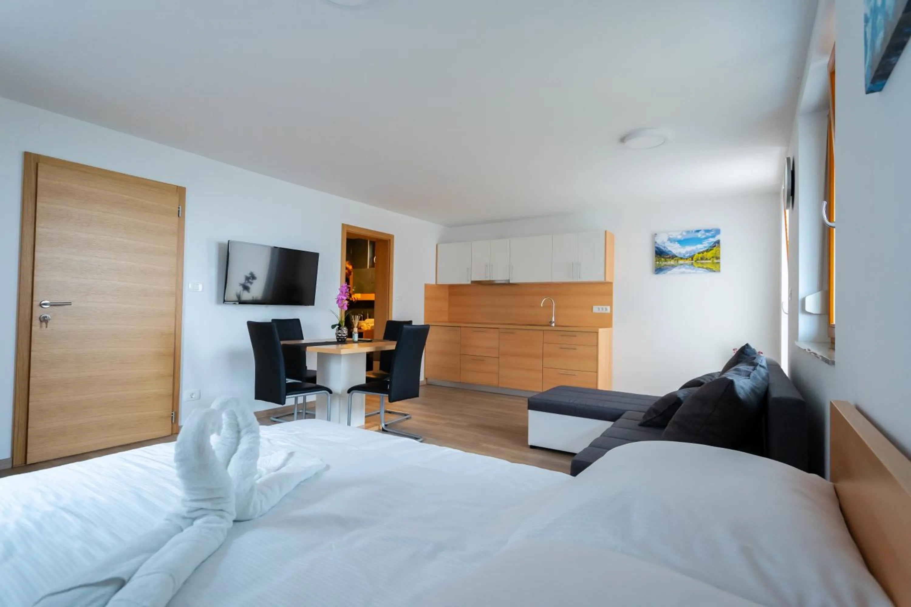 Living room, Bed in PJagodic Apartments & Wellness