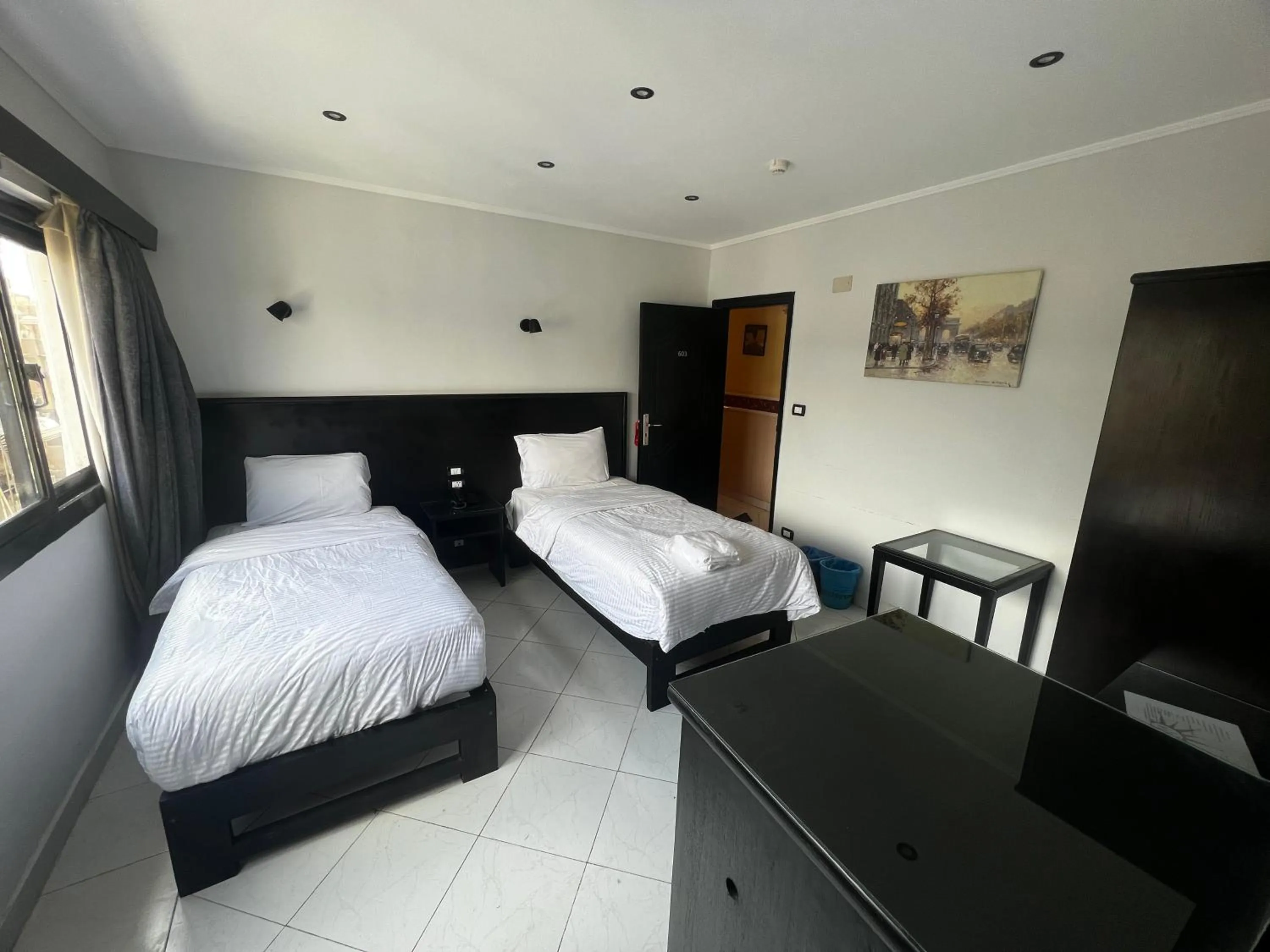 Bed in Helio Cairo Hotel