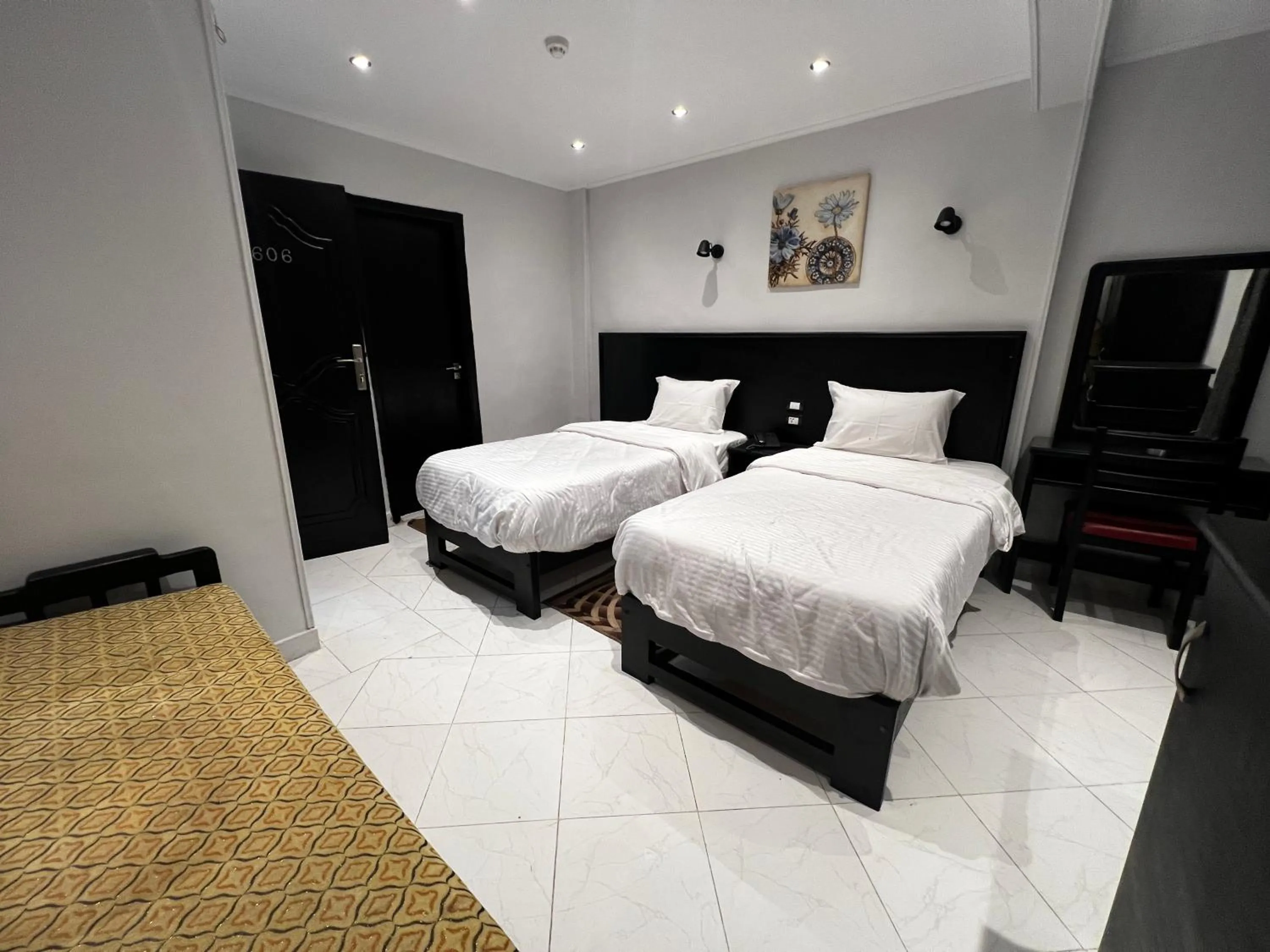 Bed in Helio Cairo Hotel