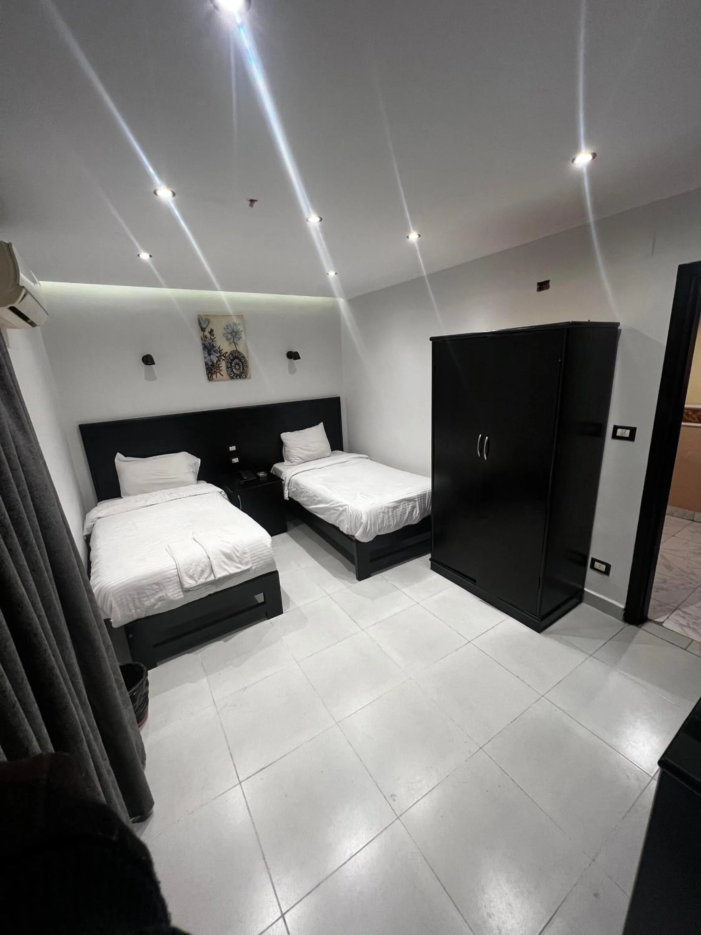 Bed in Helio Cairo Hotel