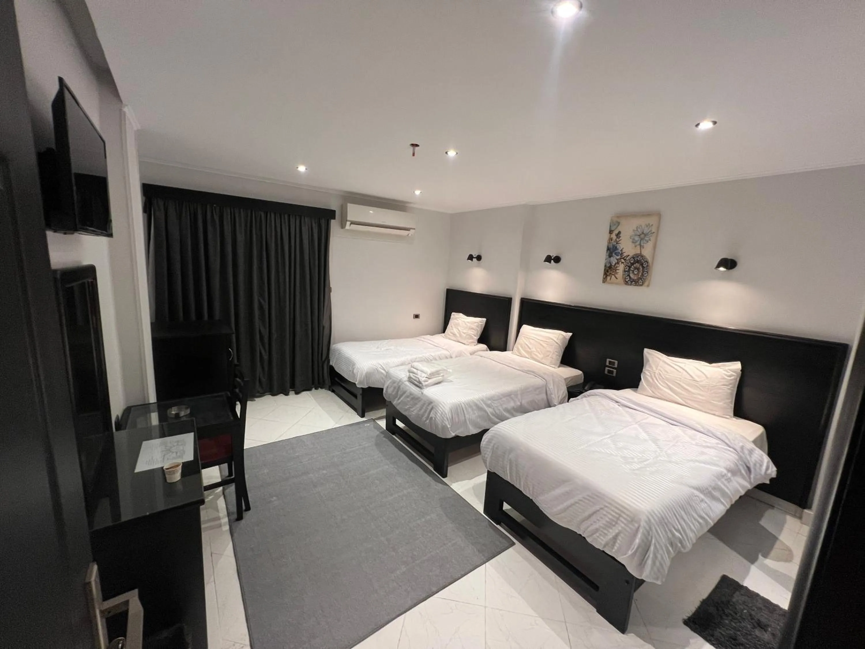 Bed in Helio Cairo Hotel