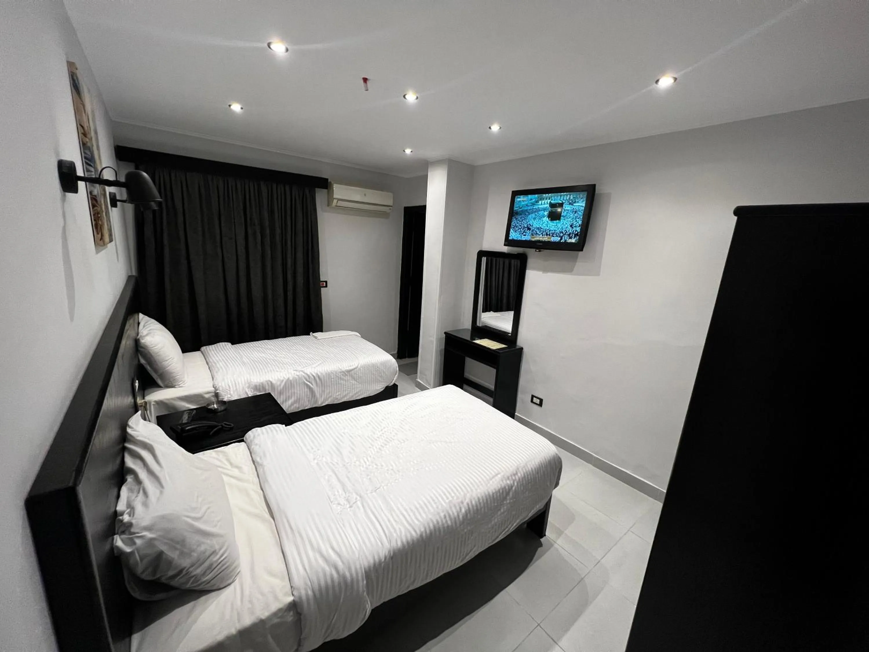 Bed in Helio Cairo Hotel