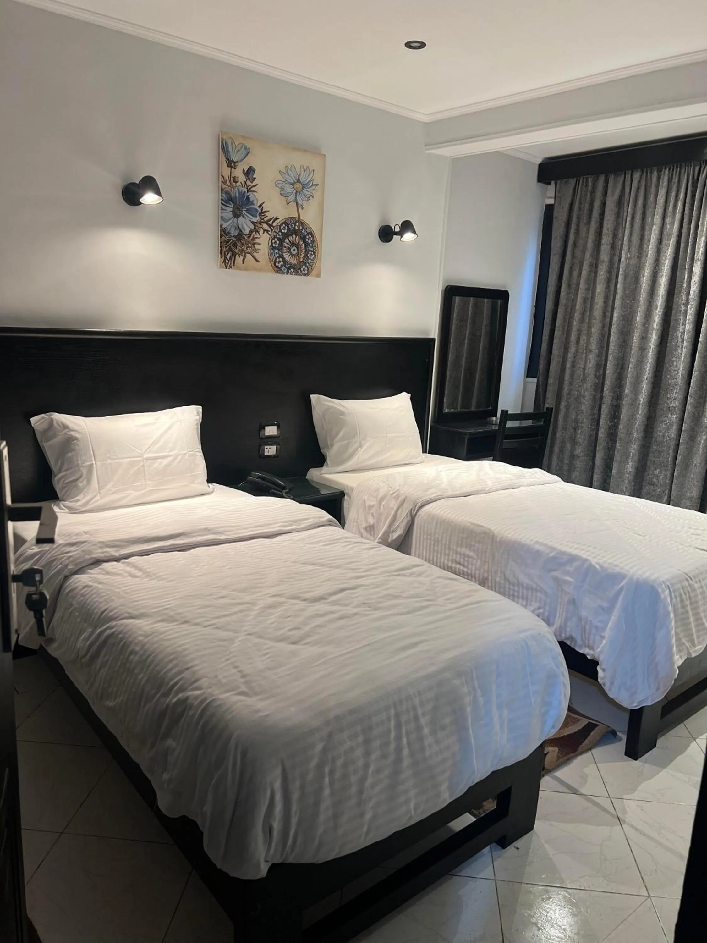 Bed in Helio Cairo Hotel