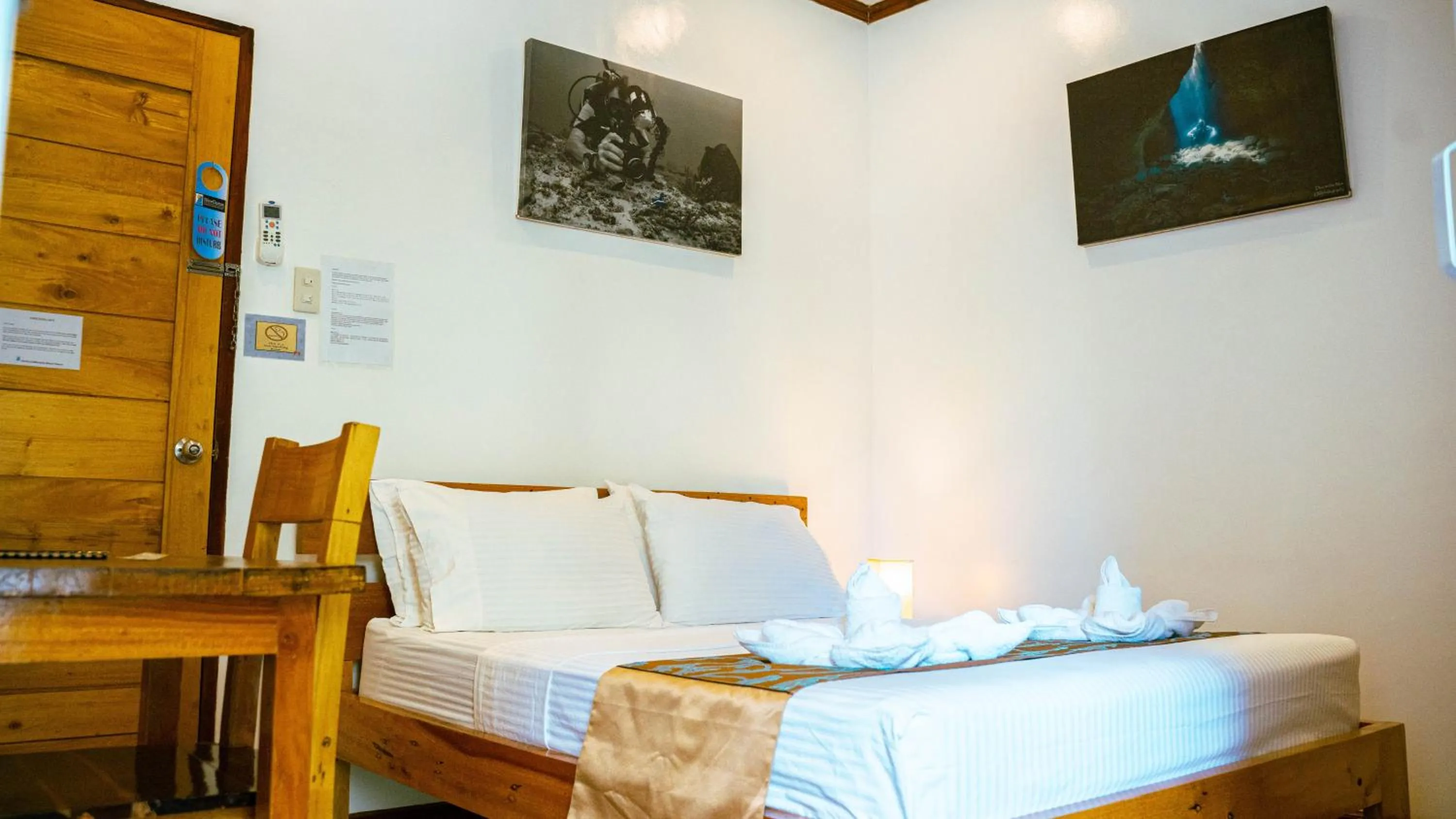 Bed in DiveGurus Boracay Beach Resort