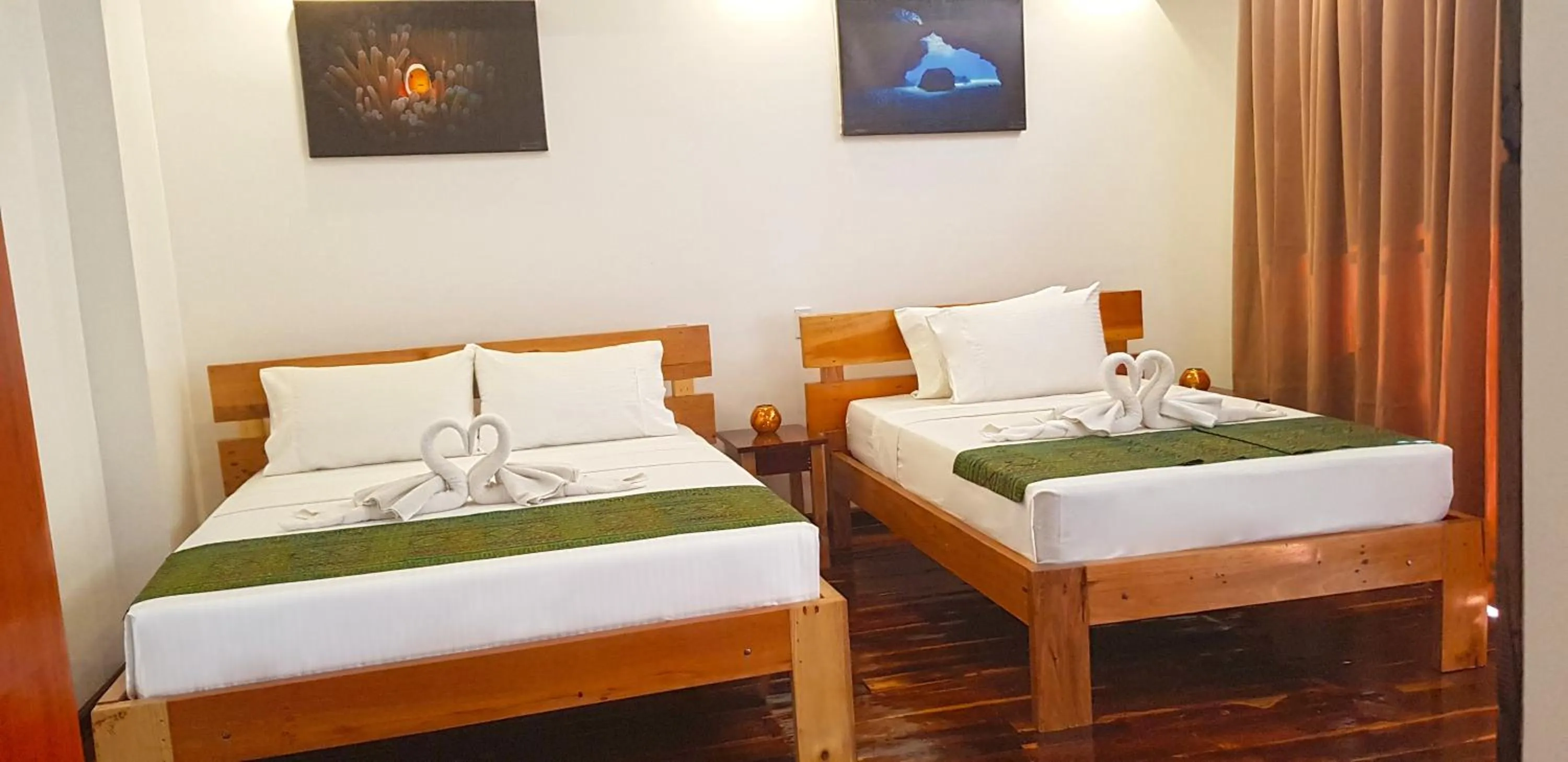 Bed in DiveGurus Boracay Beach Resort