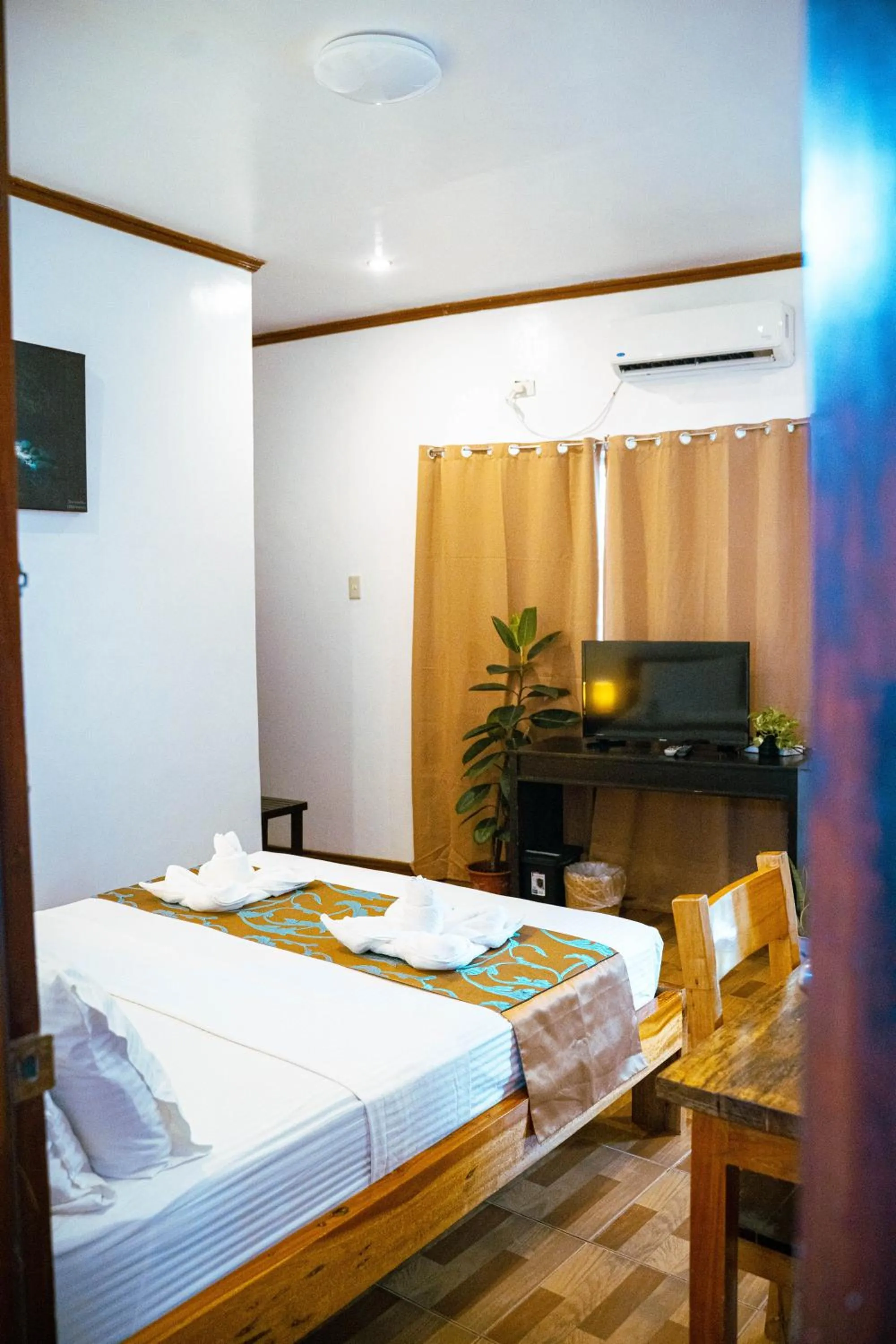 Bed in DiveGurus Boracay Beach Resort