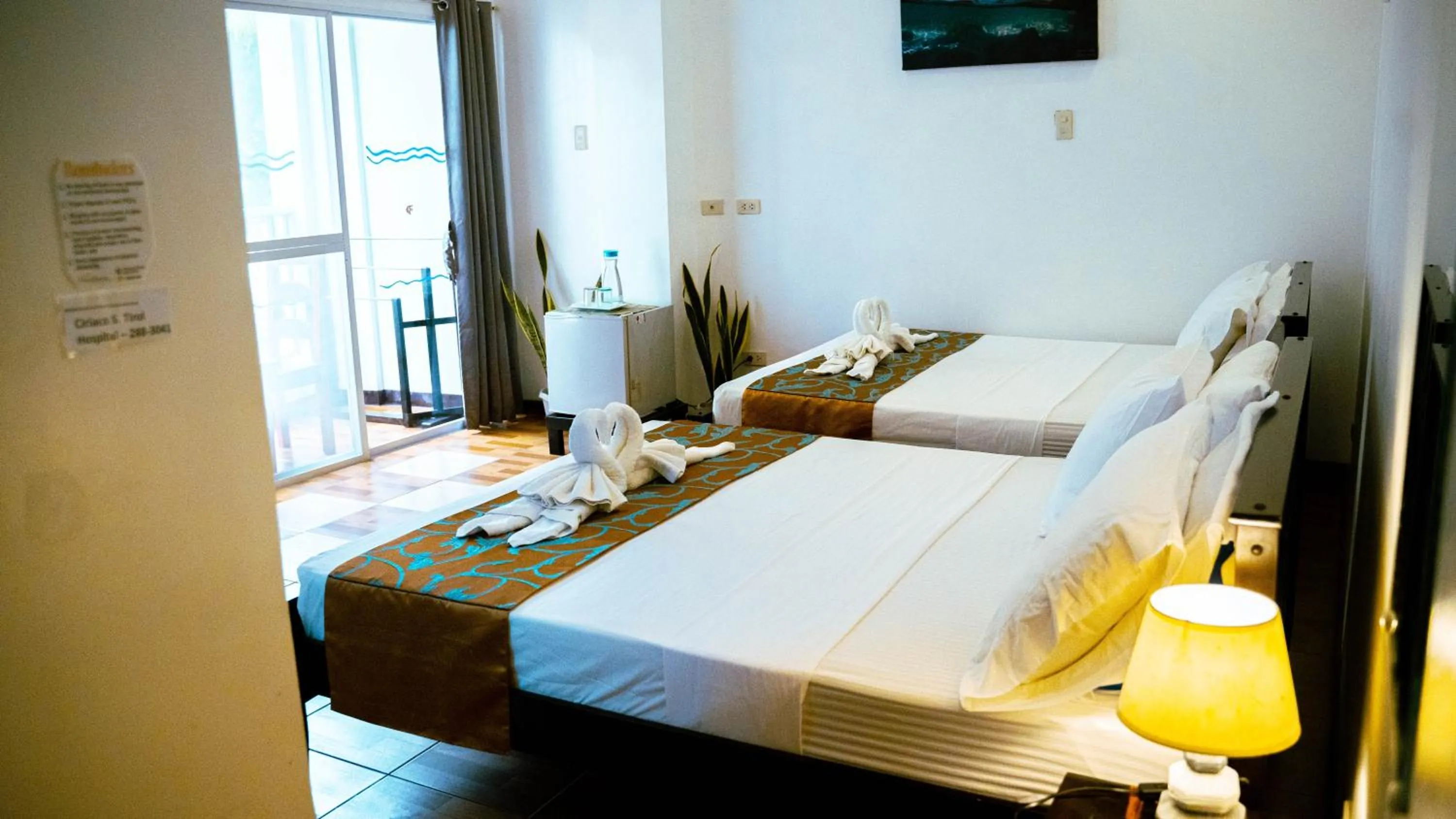 Bed in DiveGurus Boracay Beach Resort