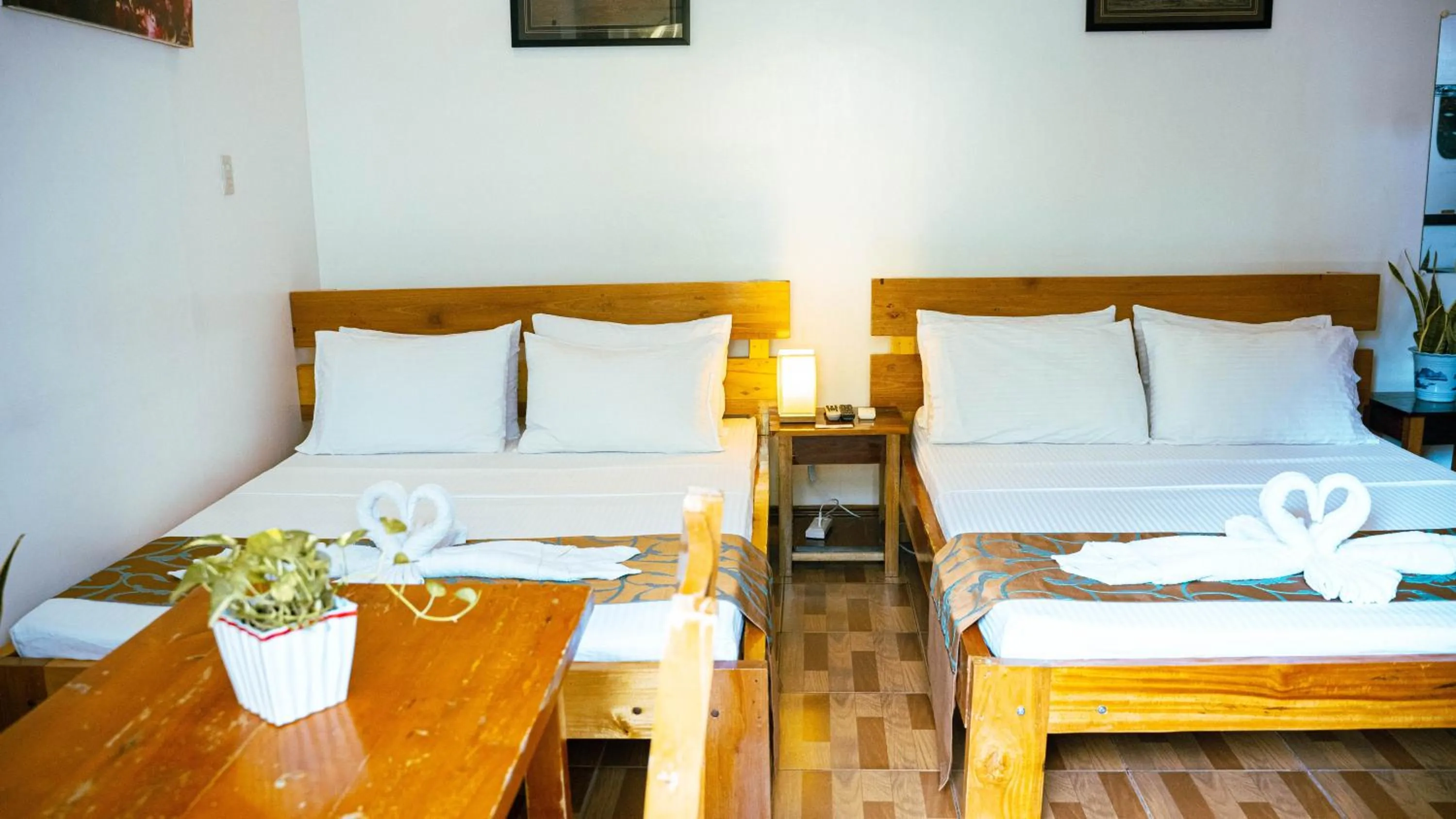 Bed in DiveGurus Boracay Beach Resort