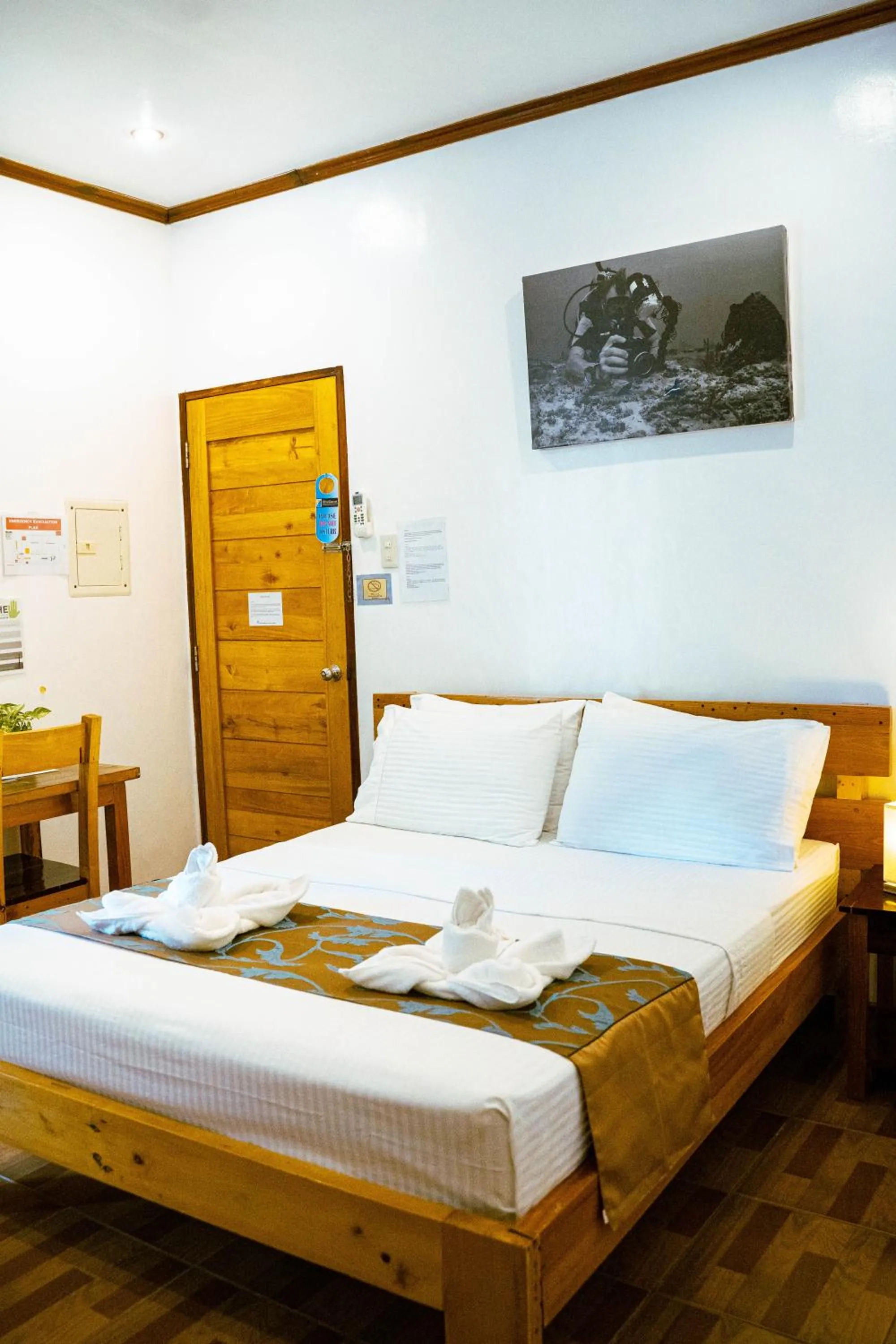 Bed in DiveGurus Boracay Beach Resort