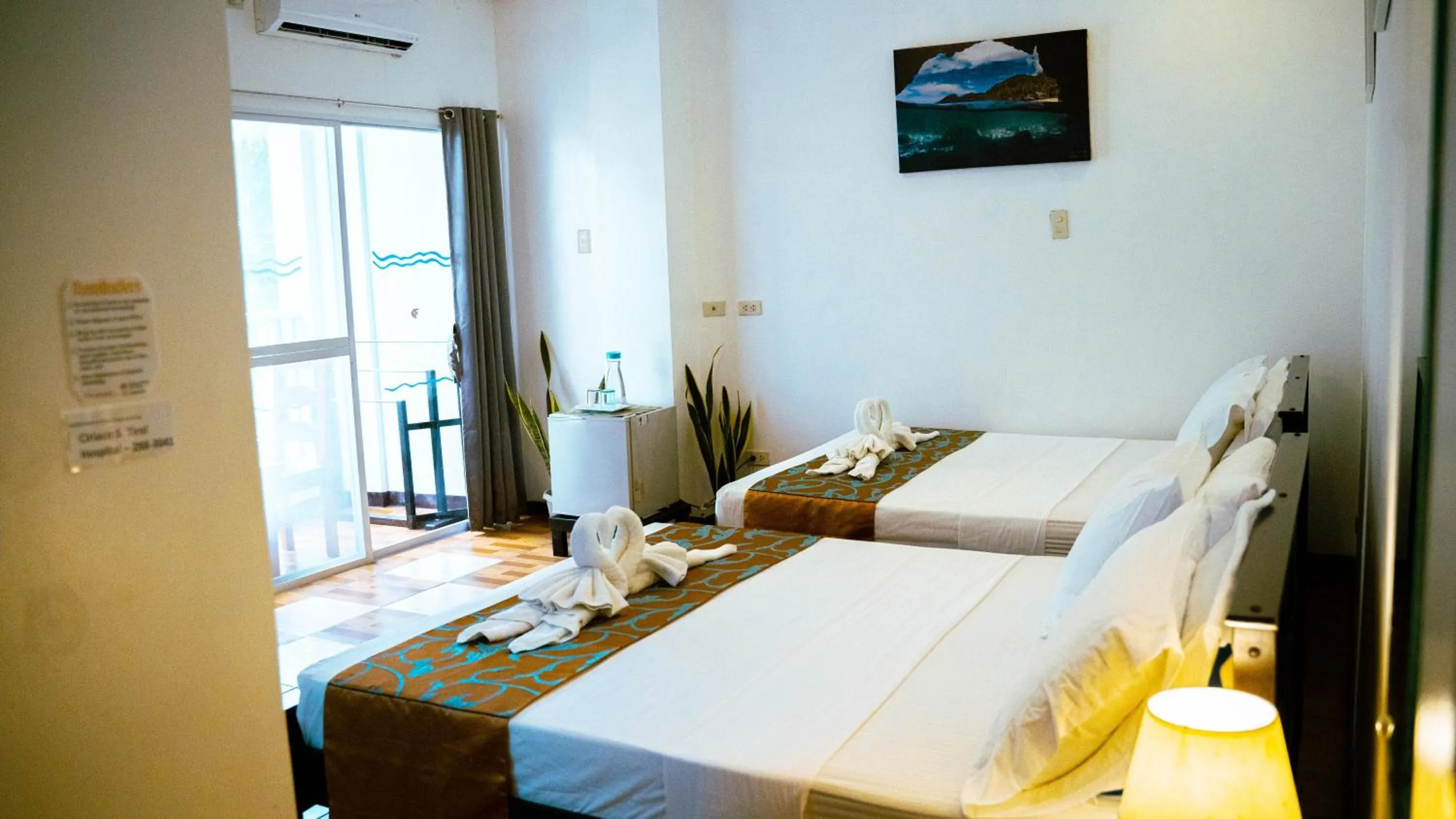 Bed in DiveGurus Boracay Beach Resort