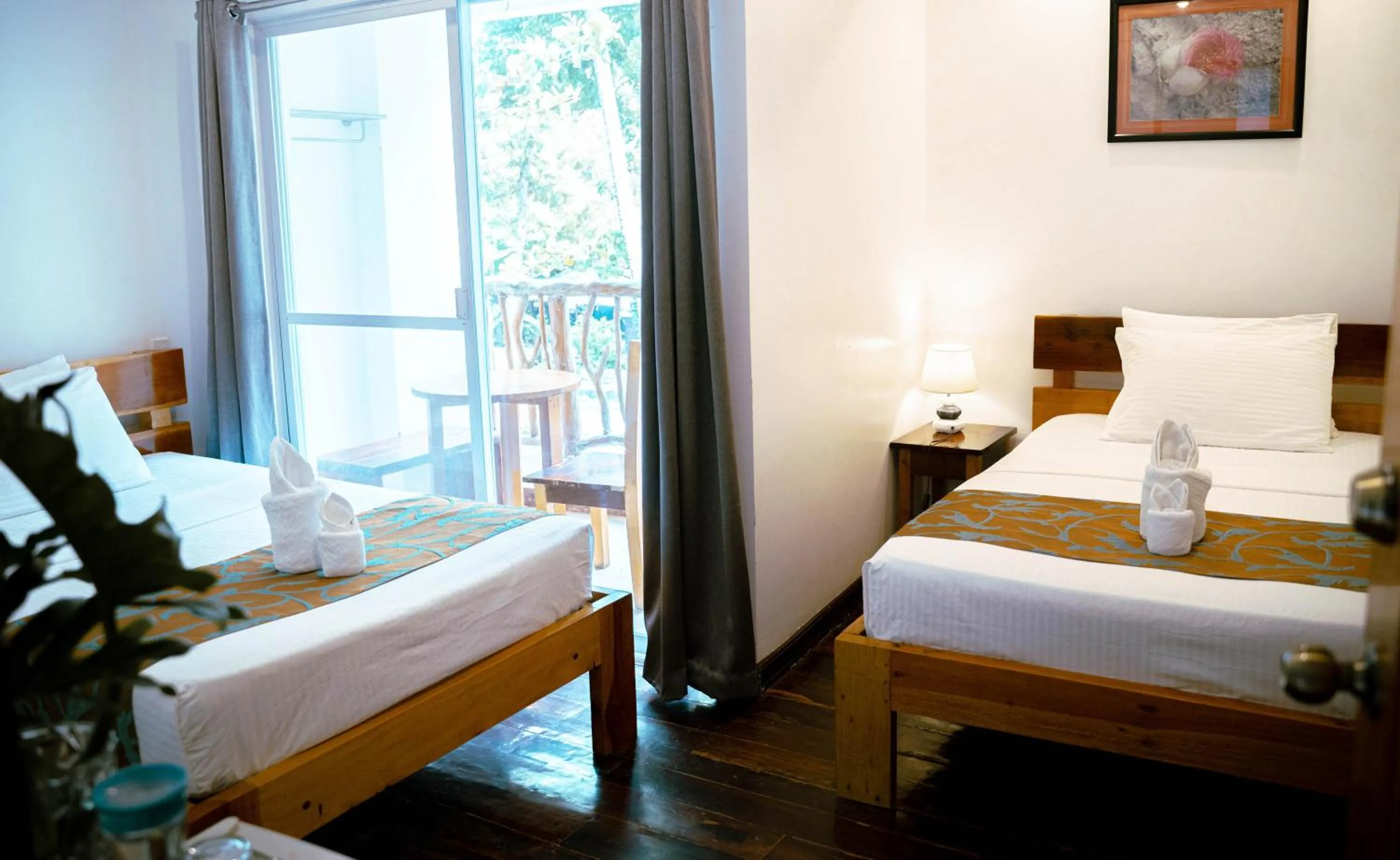 Bed in DiveGurus Boracay Beach Resort