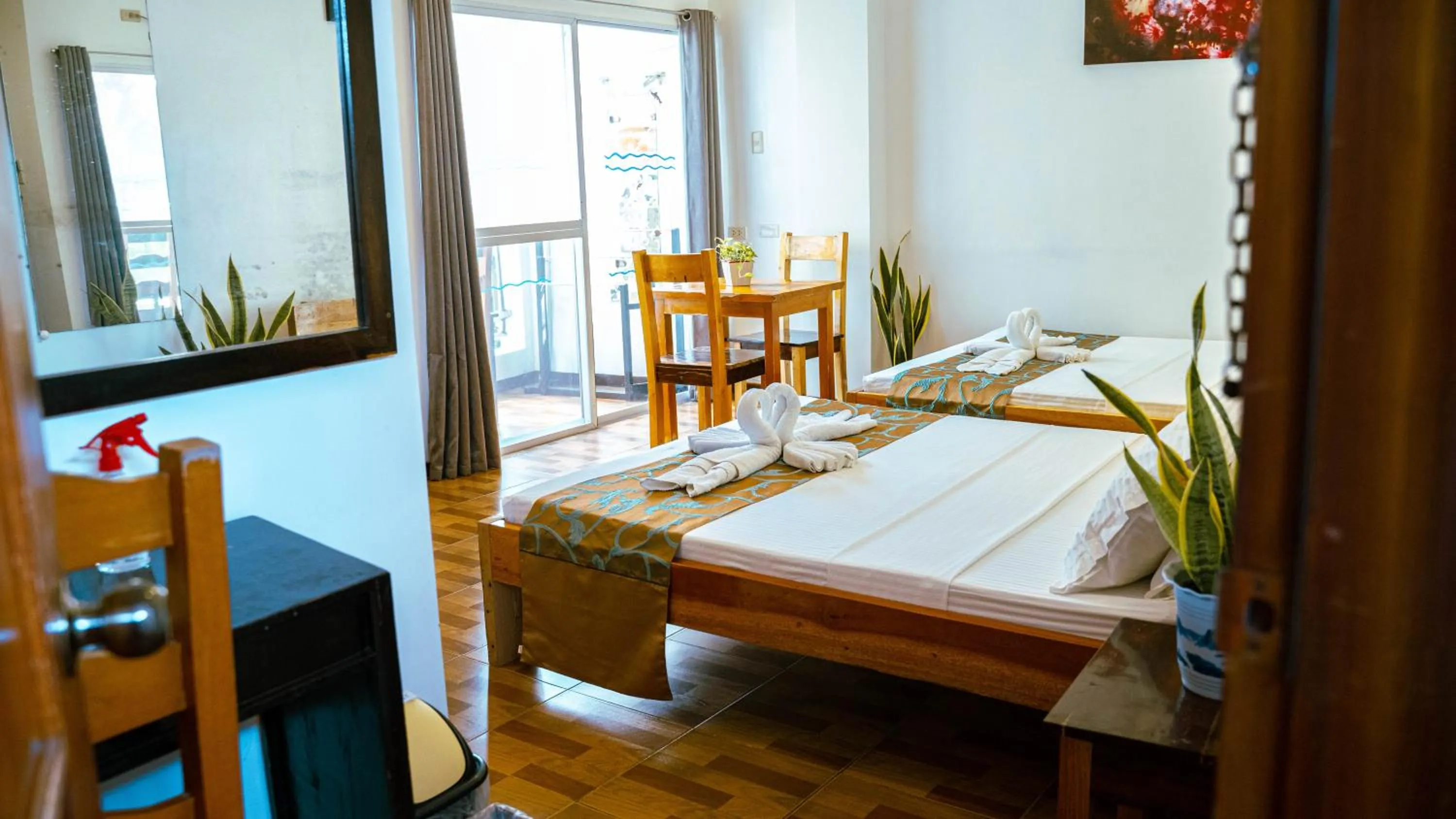 Bed in DiveGurus Boracay Beach Resort