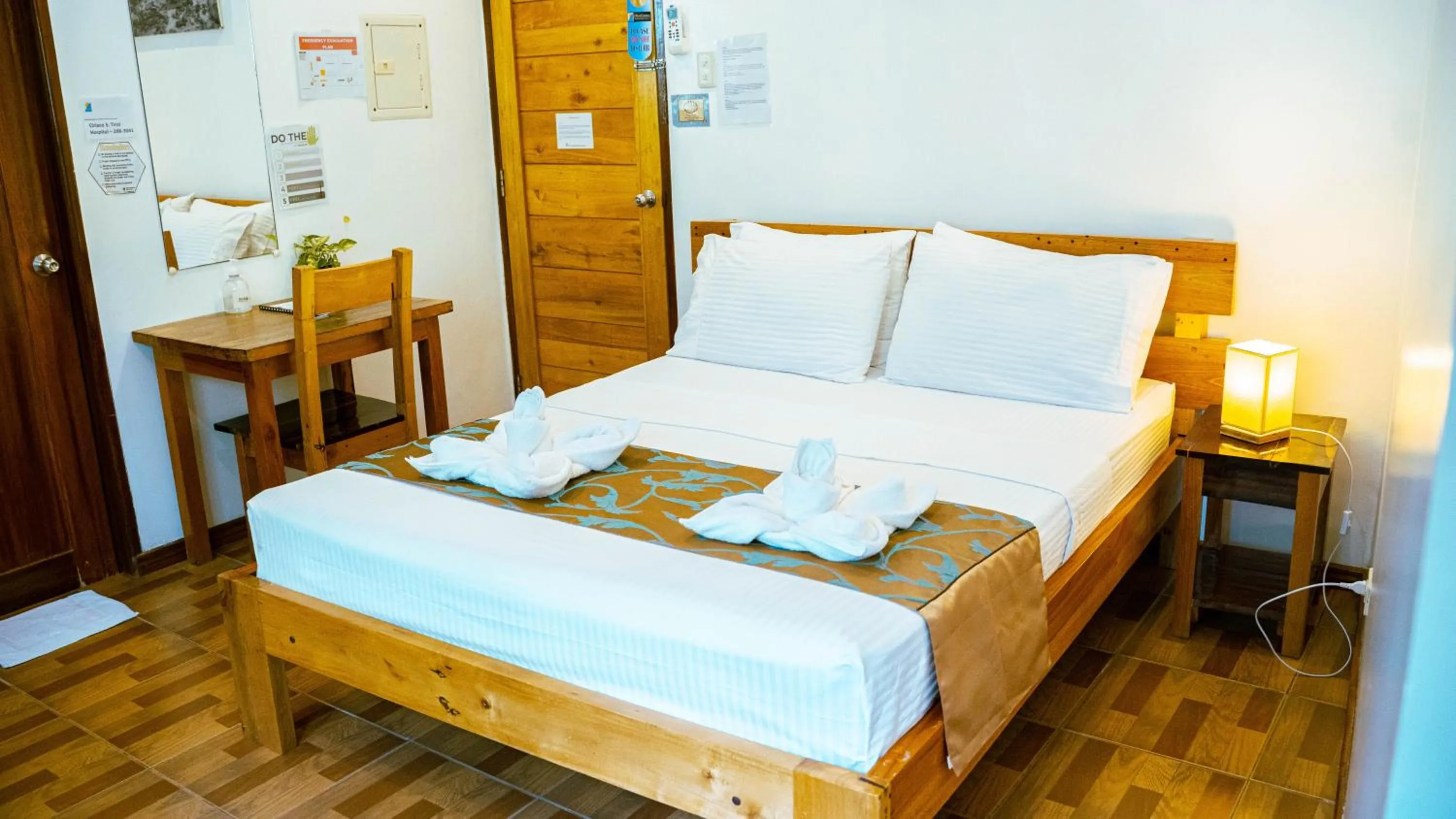 Bed in DiveGurus Boracay Beach Resort