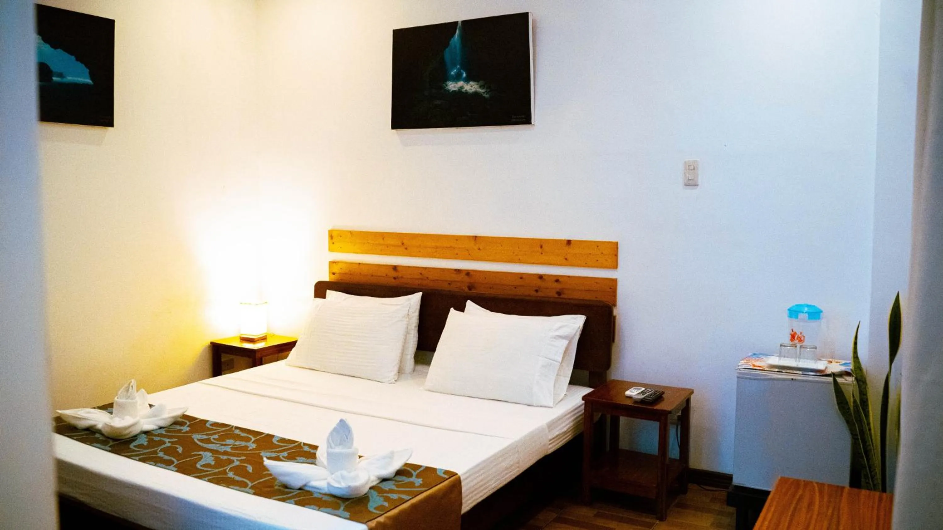 Bed in DiveGurus Boracay Beach Resort