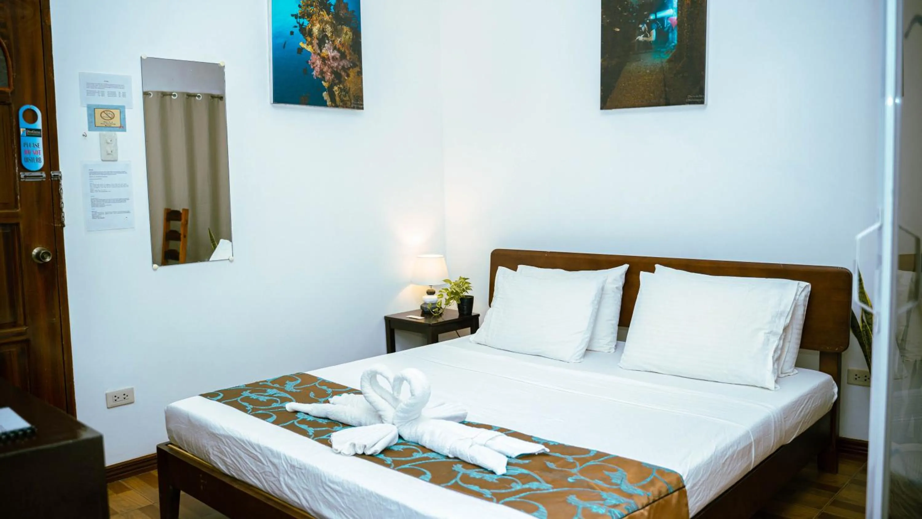 Bed in DiveGurus Boracay Beach Resort