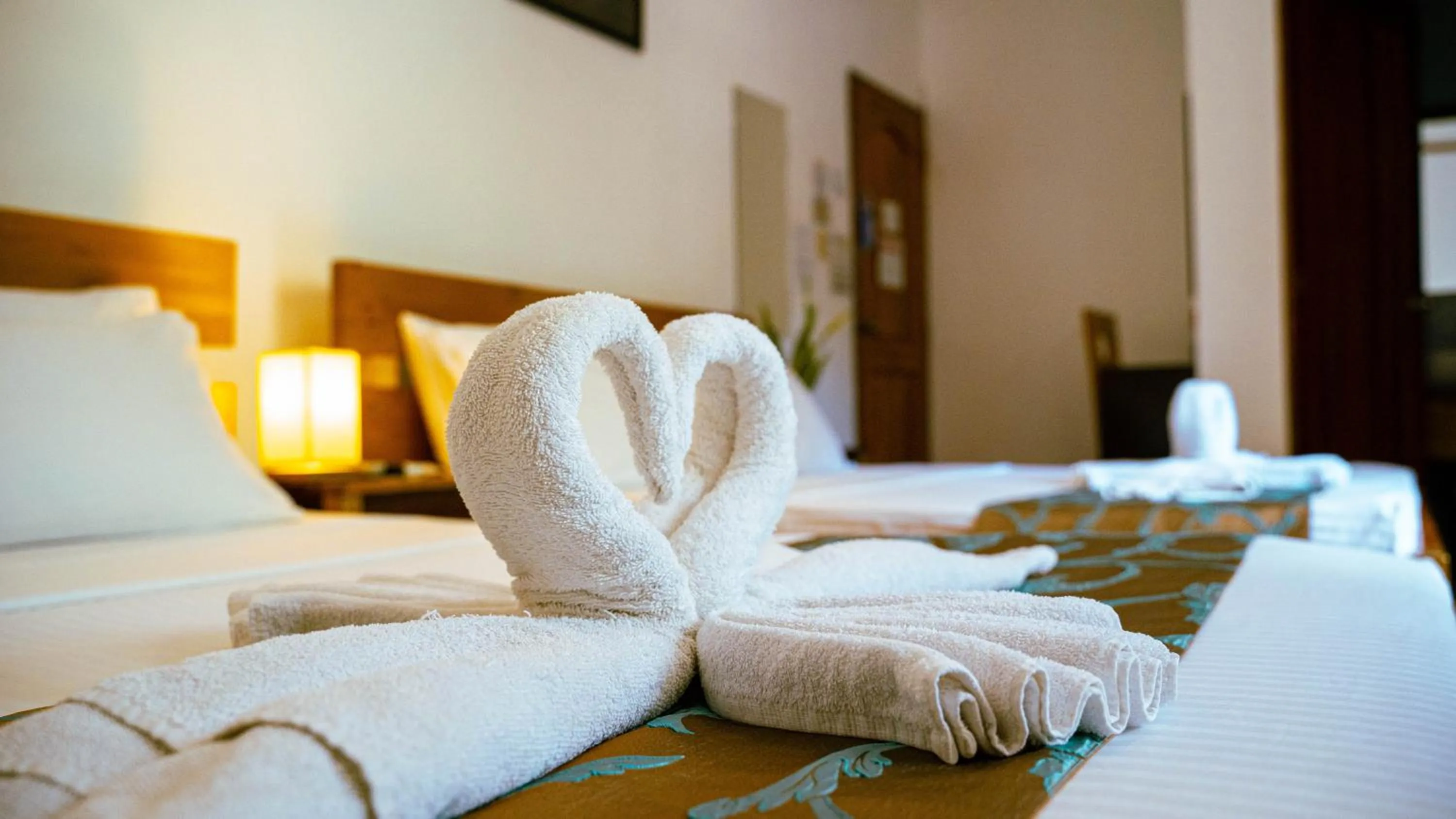 Bed in DiveGurus Boracay Beach Resort