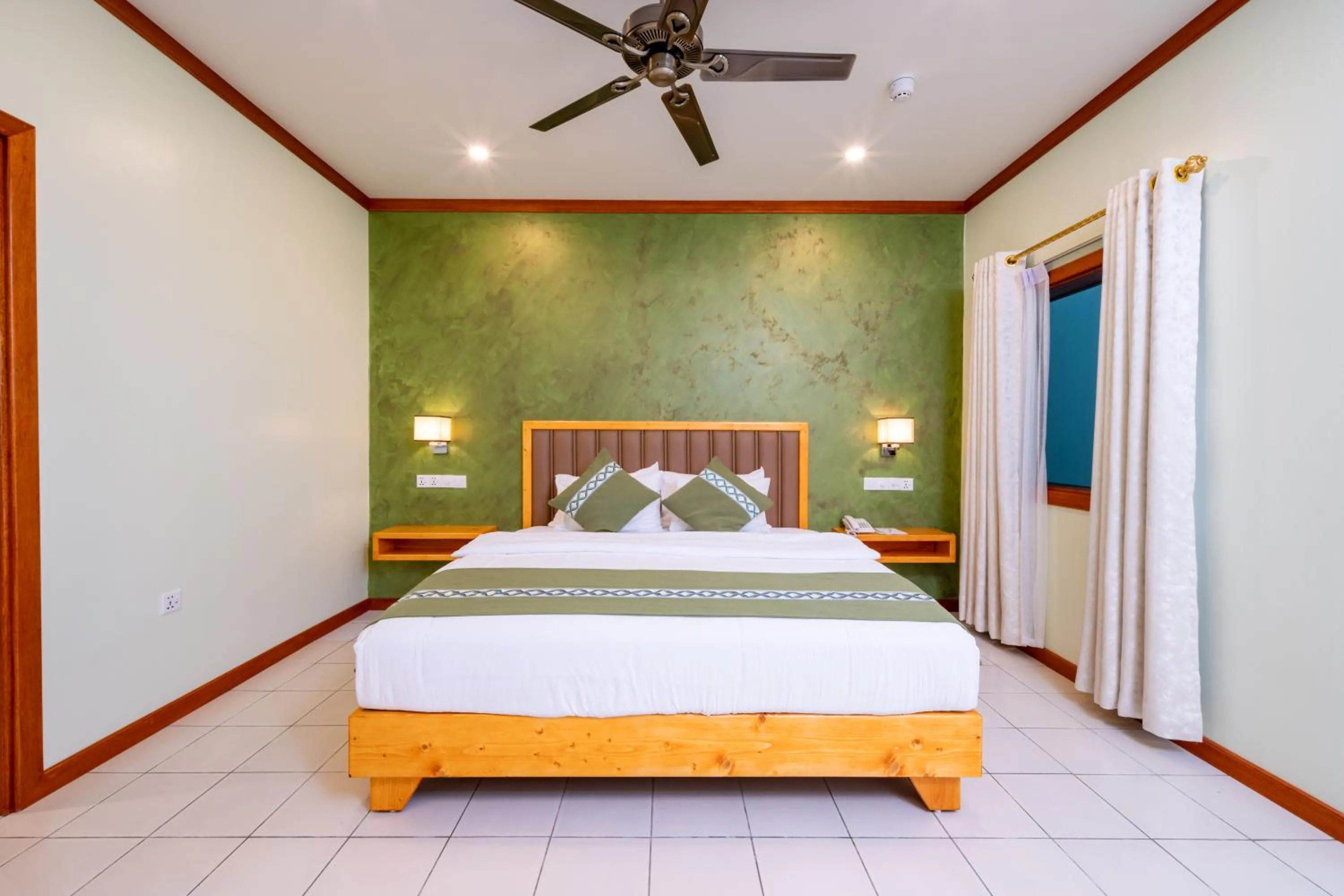 Bed in Fihalhohi Maldives