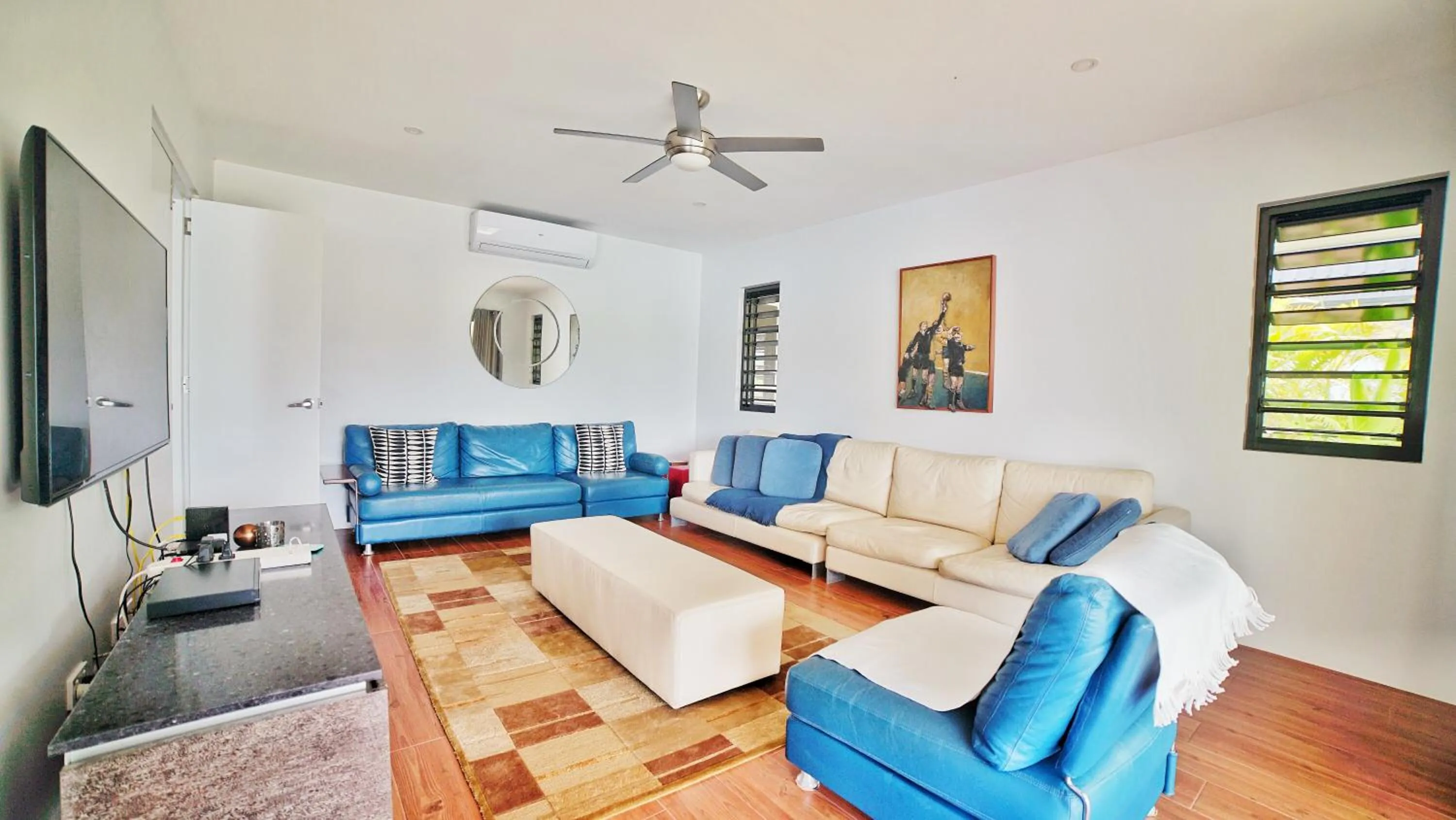 Communal lounge/ TV room in Naisoso Island Villas - Fiji