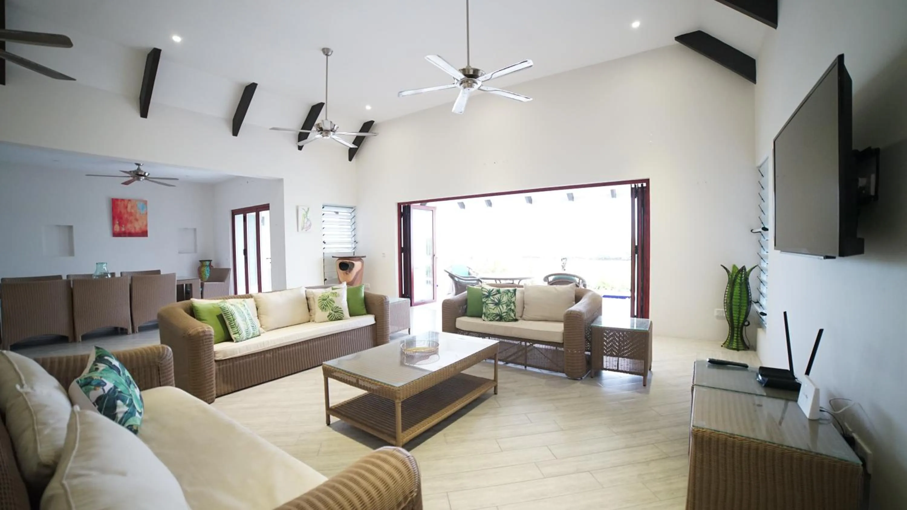 Communal lounge/ TV room in Naisoso Island Villas - Fiji