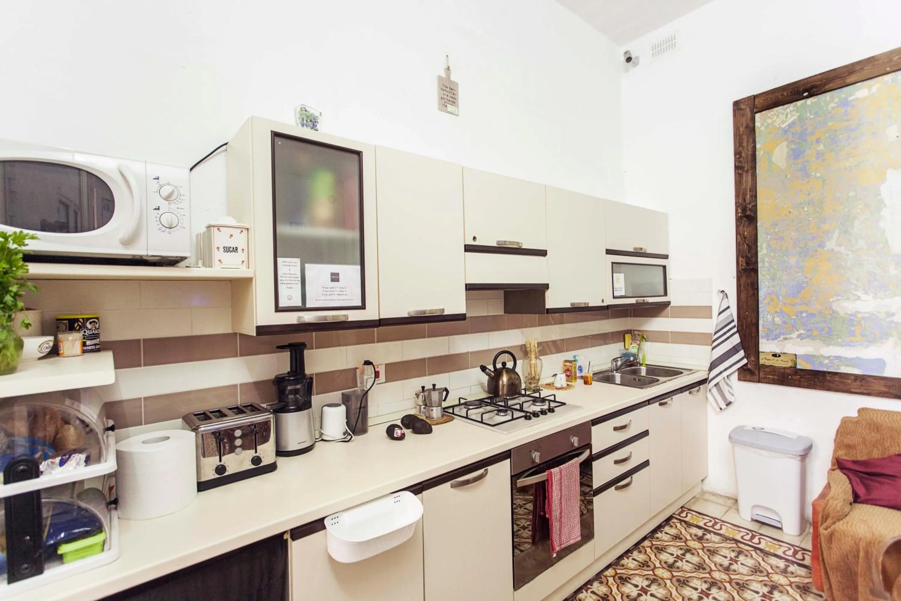 Communal lounge/ TV room in Granny's Inn Hostel