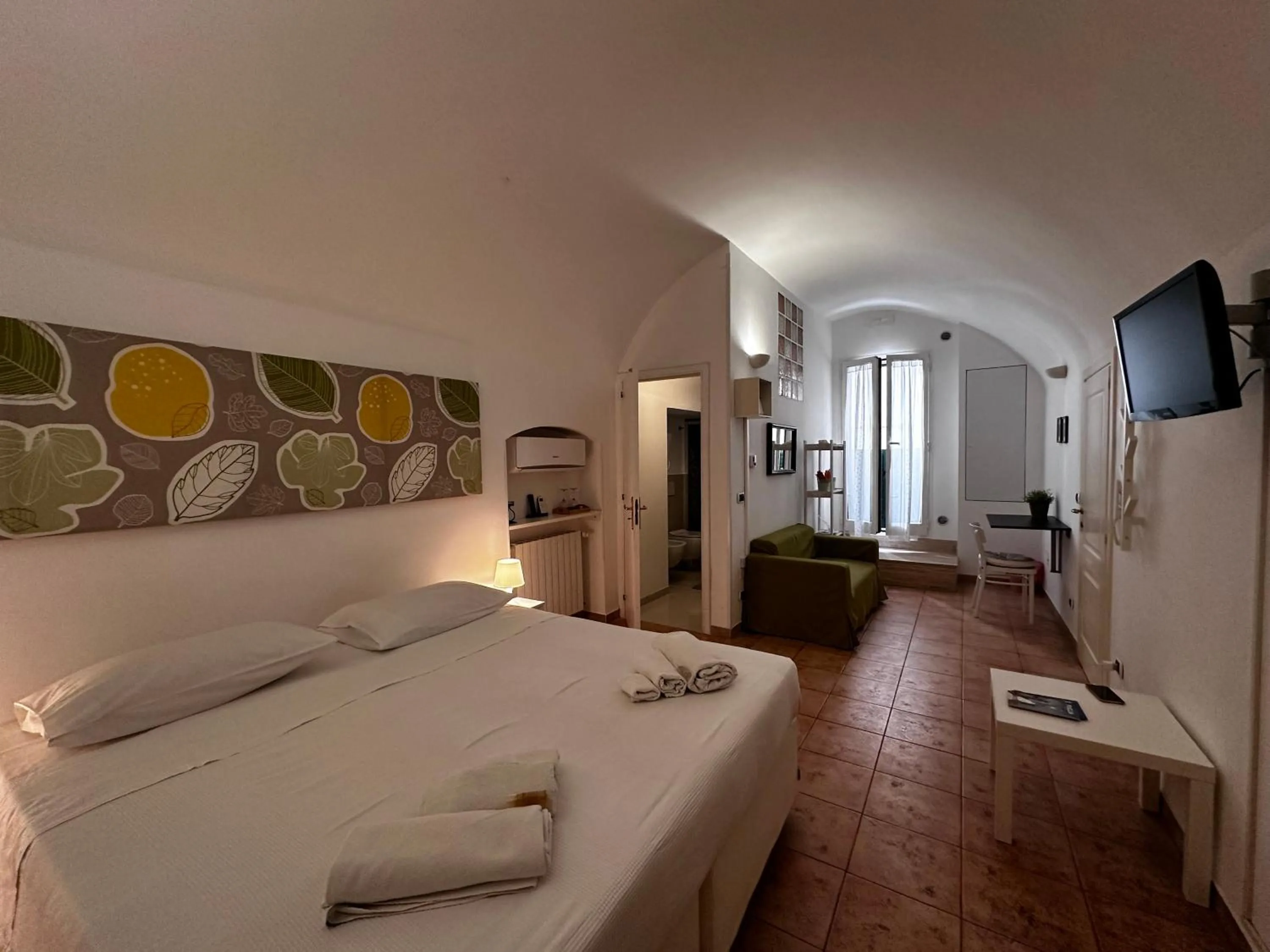 Photo of the whole room, Bed in La Torre e il Mare Rooms by STHEY