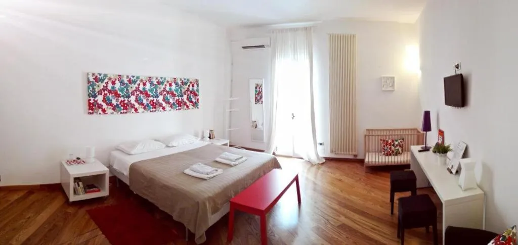 Photo of the whole room, Bed in La Torre e il Mare Rooms by STHEY