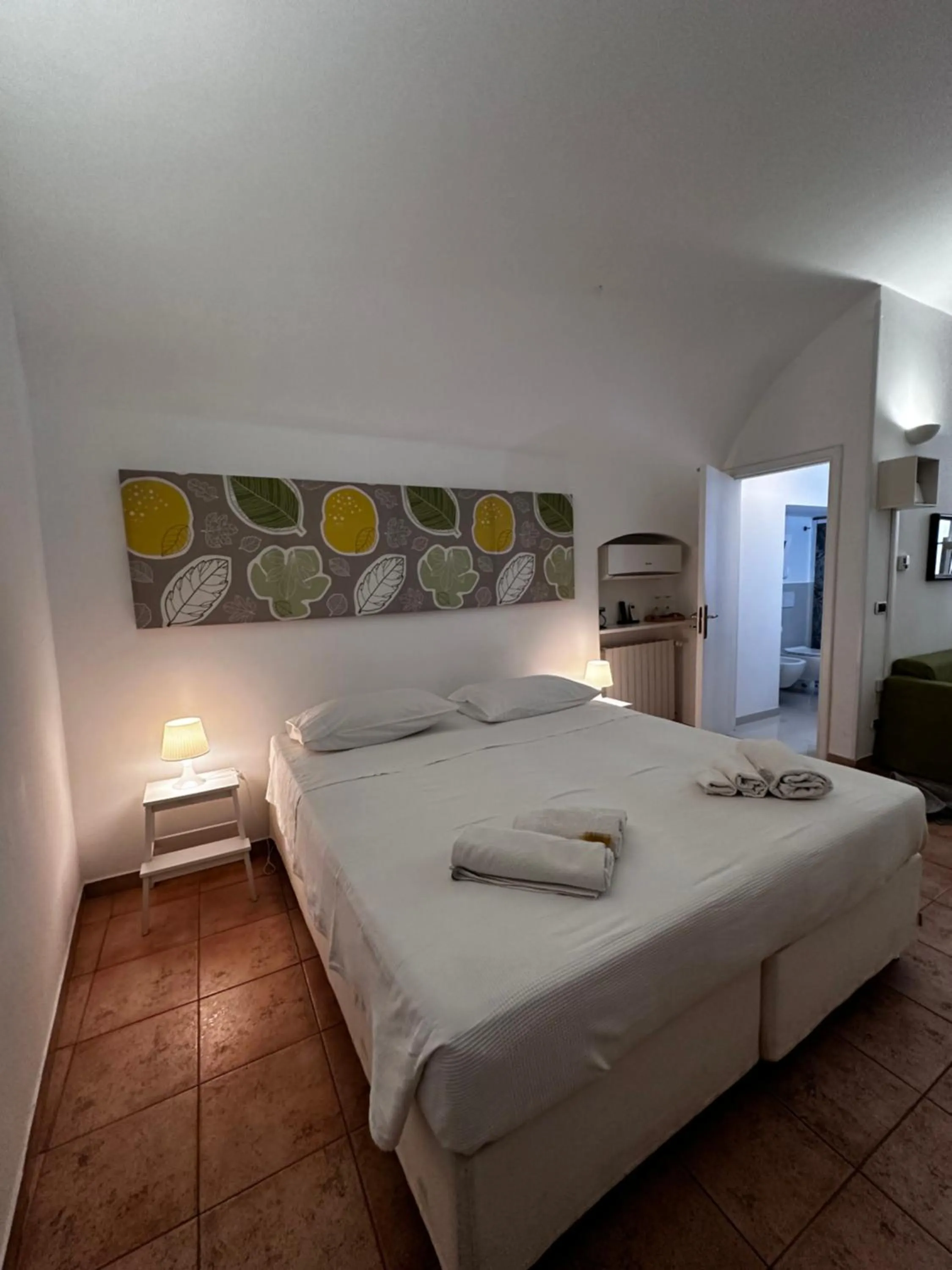 Photo of the whole room, Bed in La Torre e il Mare Rooms by STHEY