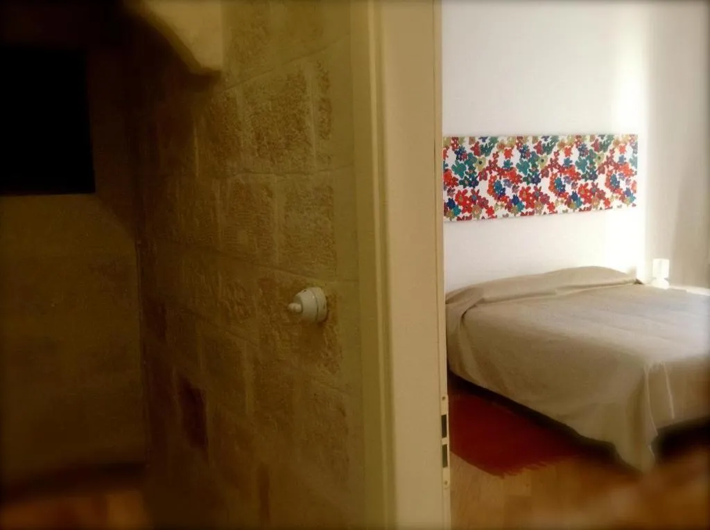 Bedroom, Bed in La Torre e il Mare Rooms by STHEY