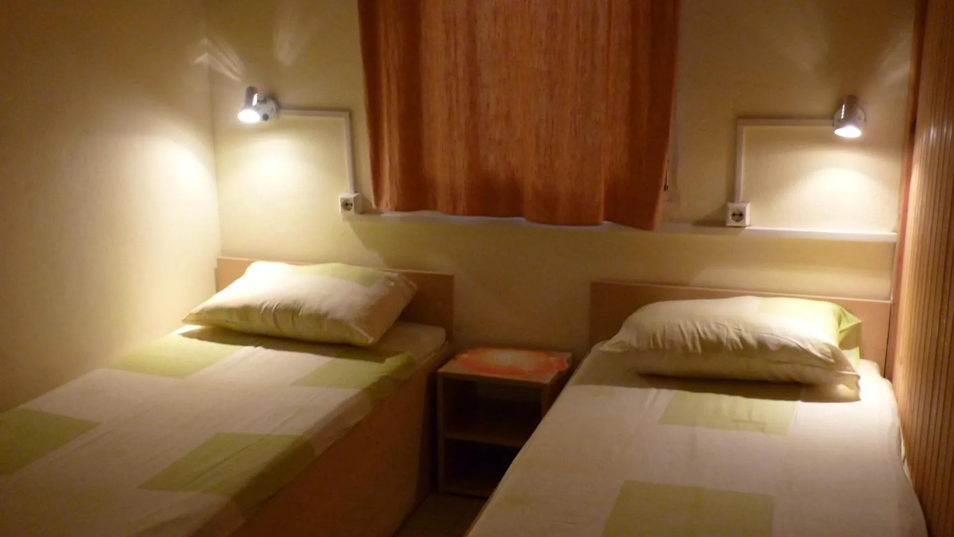 Bed in Nimpha Bungalows