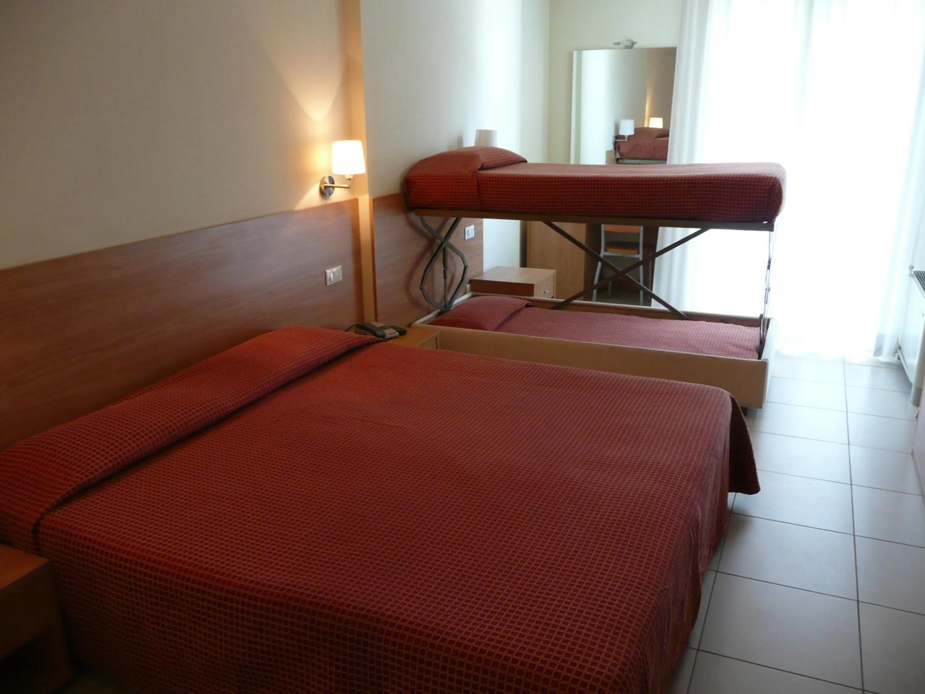 Bedroom, Bed in Hotel Majorca sul Mare in centro a Riccione con Area Fitness