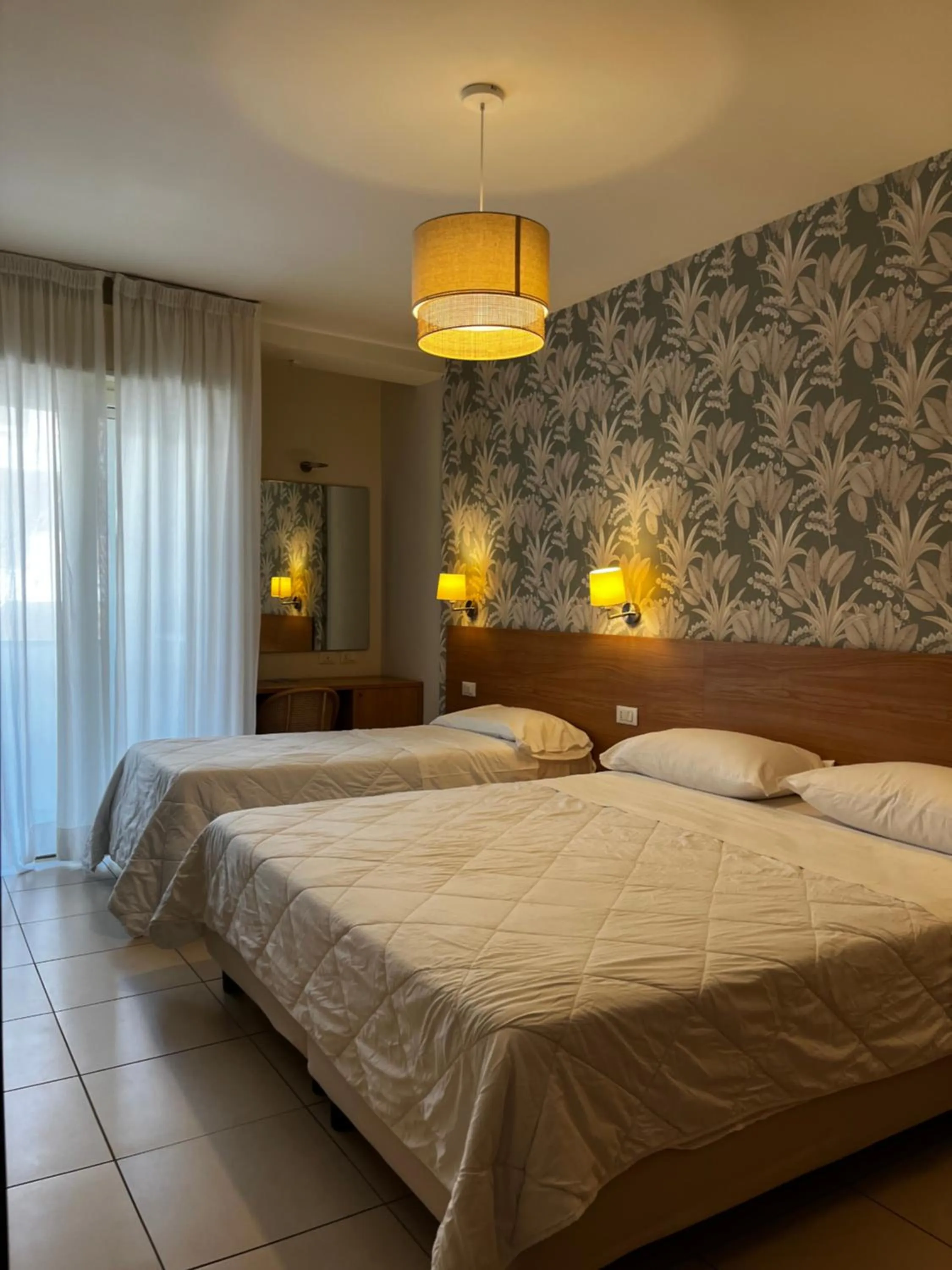 Bedroom, Bed in Hotel Majorca sul Mare in centro a Riccione con Area Fitness