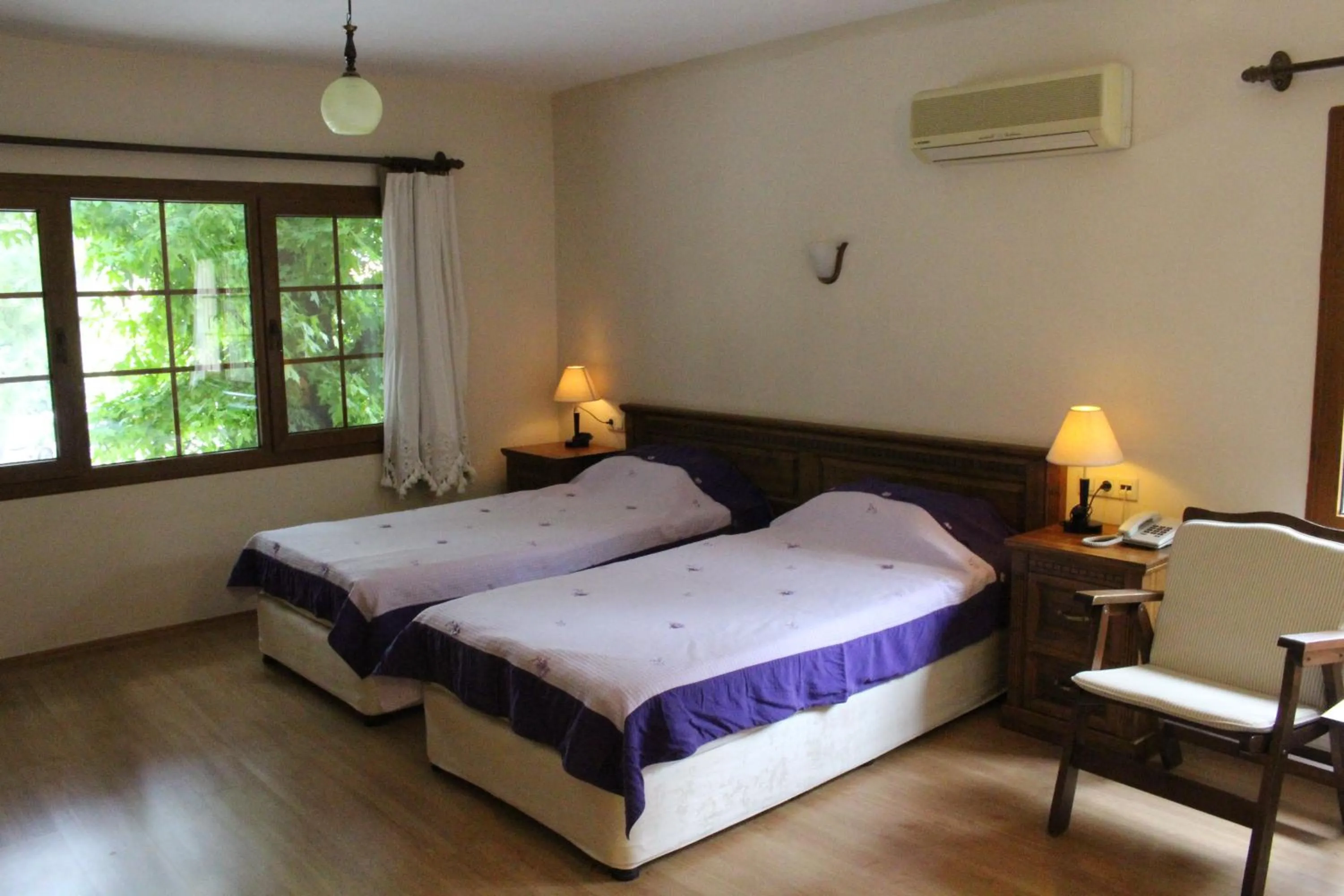 Bedroom, Bed in Nirvana Hotel